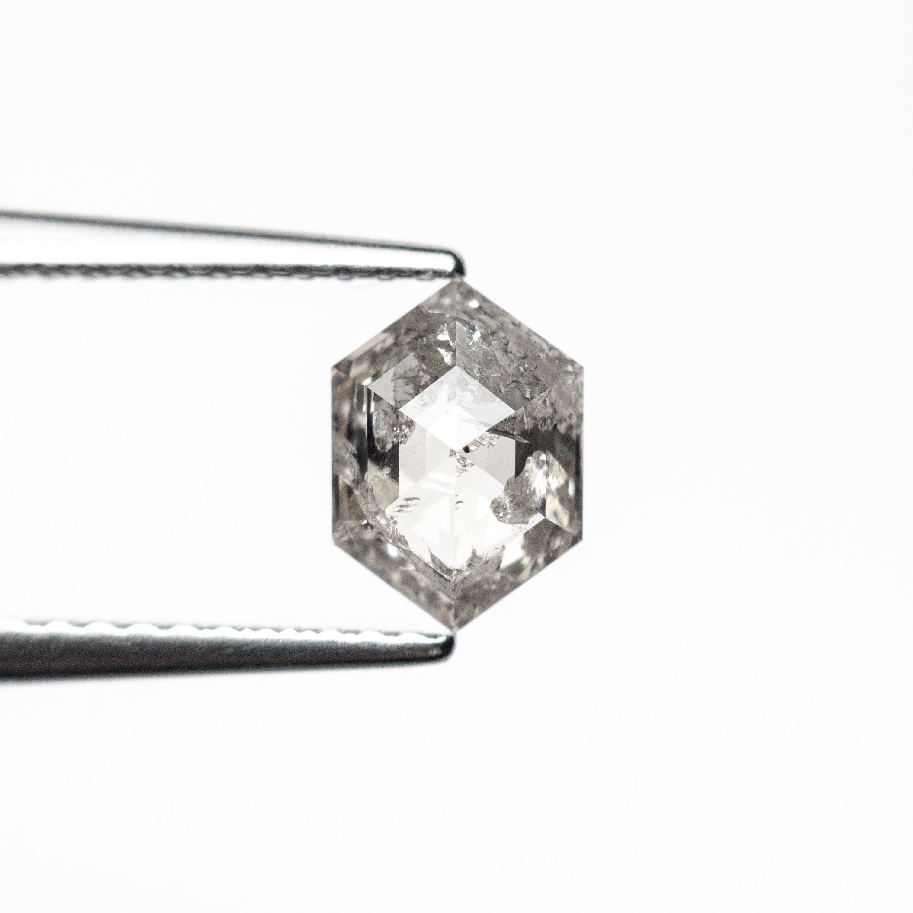 The 0.95ct 7.45x5.30x3.11mm Hexagon Step Cut 🇨🇦 27035-01 by East London jeweller Rachel Boston | Discover our collections of unique and timeless engagement rings, wedding rings, and modern fine jewellery.