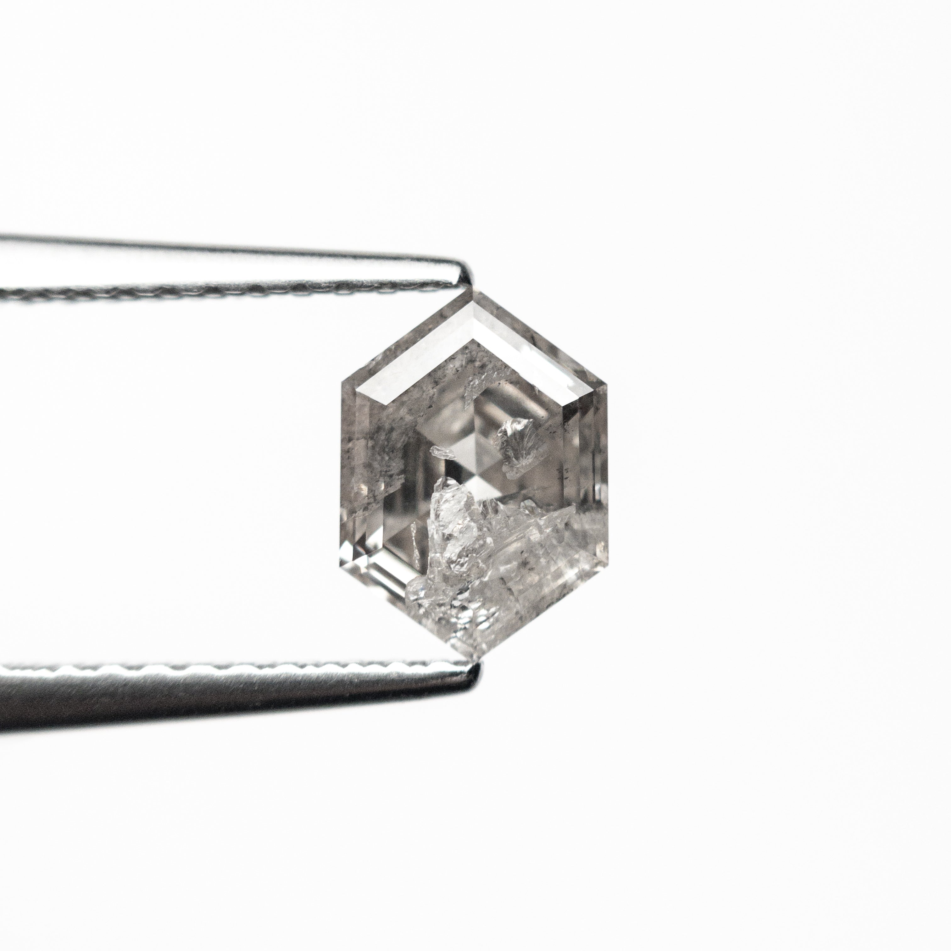 The 0.95ct 7.45x5.30x3.11mm Hexagon Step Cut 🇨🇦 27035-01 by East London jeweller Rachel Boston | Discover our collections of unique and timeless engagement rings, wedding rings, and modern fine jewellery.