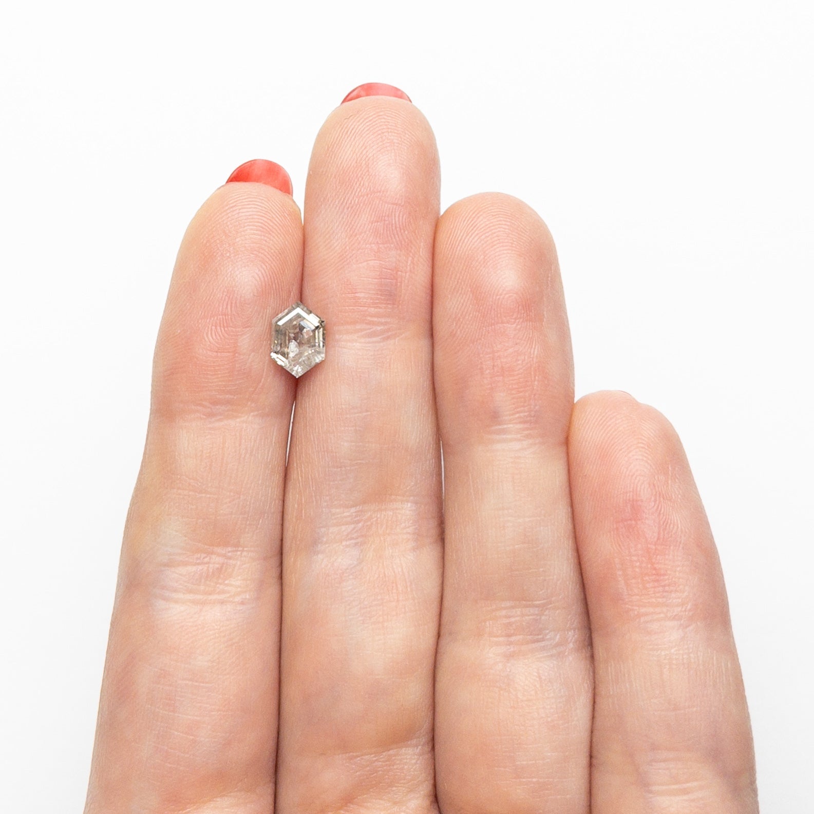 The 0.95ct 7.45x5.30x3.11mm Hexagon Step Cut 🇨🇦 27035-01 by East London jeweller Rachel Boston | Discover our collections of unique and timeless engagement rings, wedding rings, and modern fine jewellery.