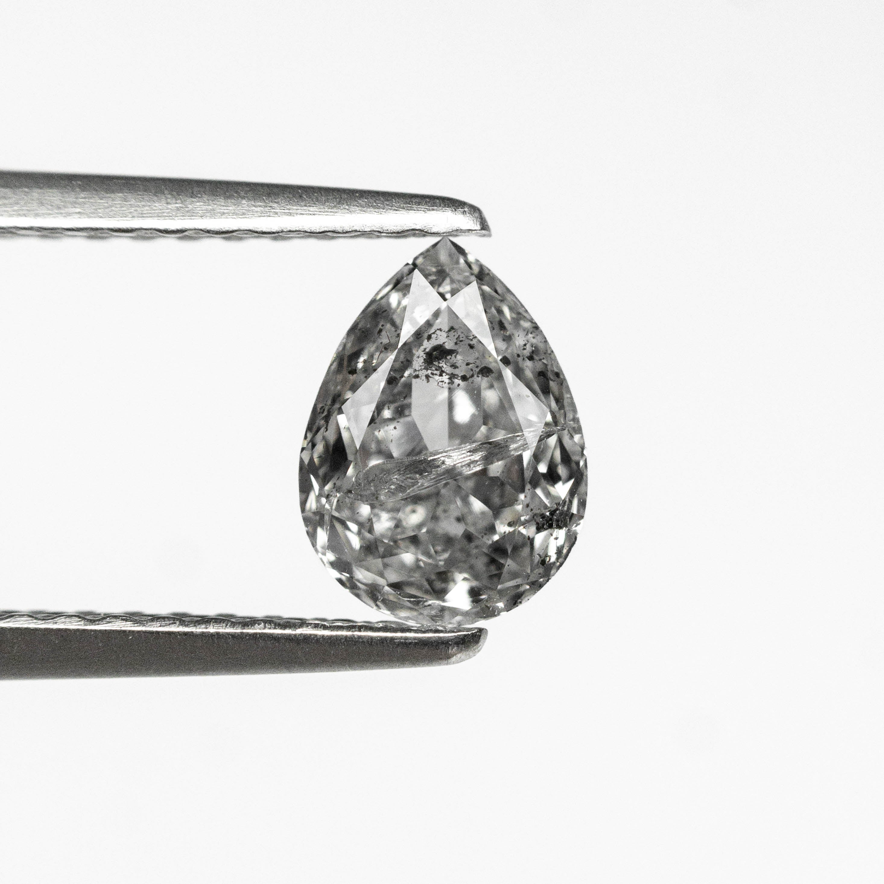 The 0.77ct 6.96x5.14x2.97mm Pear Brilliant 🇨🇦 27038-01 by East London jeweller Rachel Boston | Discover our collections of unique and timeless engagement rings, wedding rings, and modern fine jewellery.