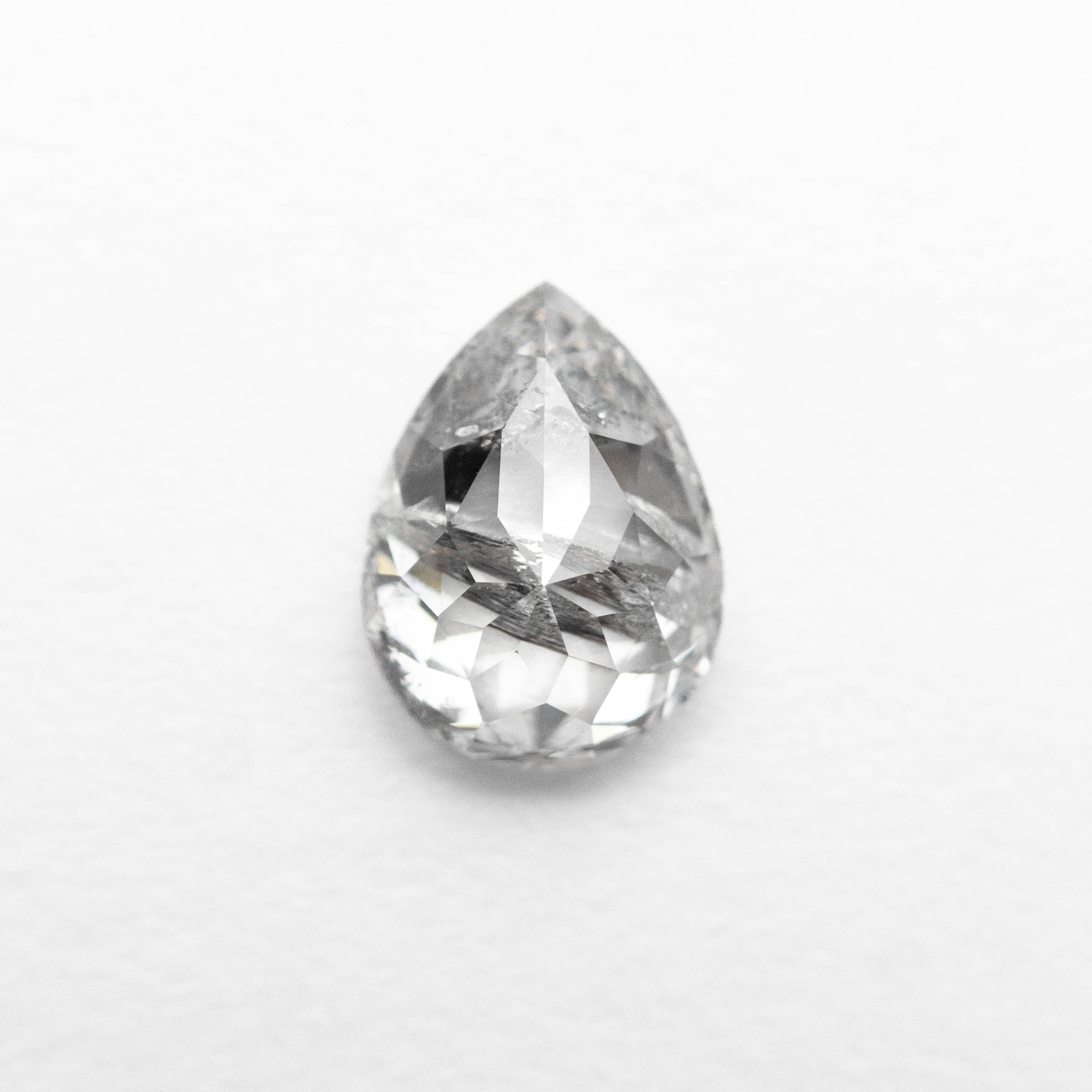 The 0.77ct 6.96x5.14x2.97mm Pear Brilliant 🇨🇦 27038-01 by East London jeweller Rachel Boston | Discover our collections of unique and timeless engagement rings, wedding rings, and modern fine jewellery.