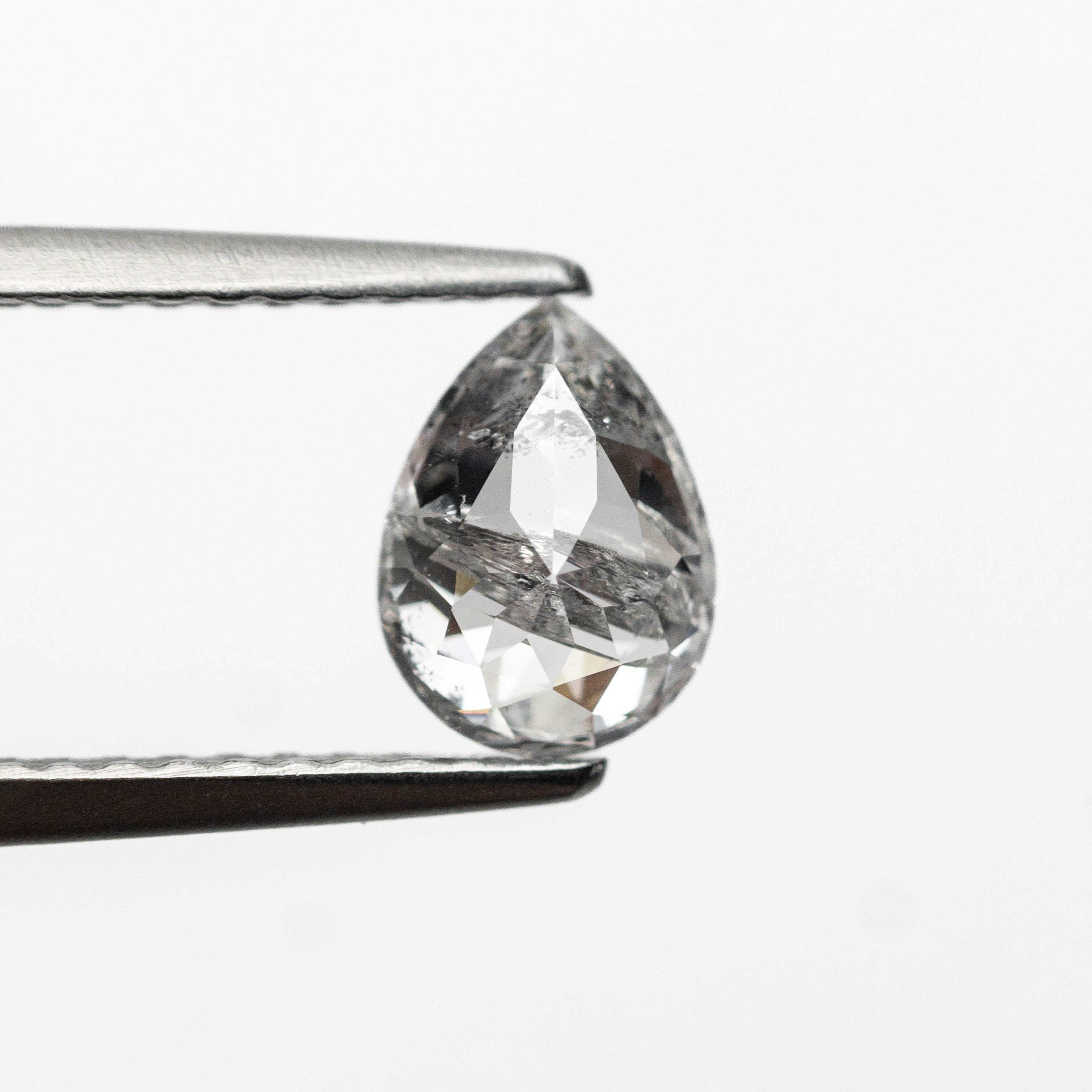 The 0.77ct 6.96x5.14x2.97mm Pear Brilliant 🇨🇦 27038-01 by East London jeweller Rachel Boston | Discover our collections of unique and timeless engagement rings, wedding rings, and modern fine jewellery.