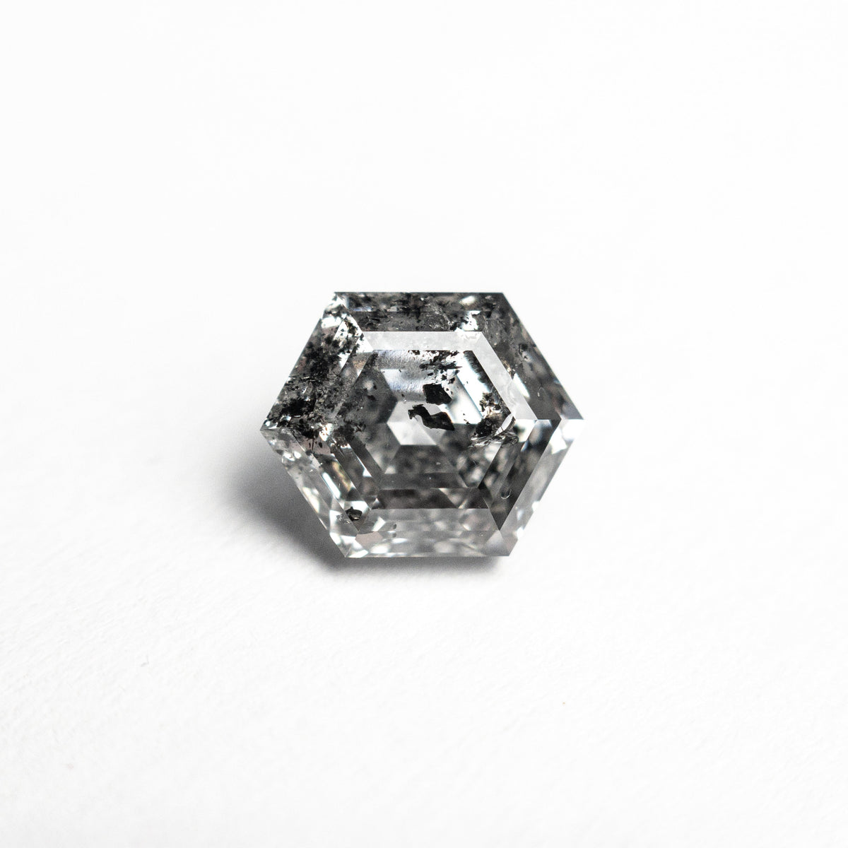 The 1.32ct 7.19x5.87x4.16mm Hexagon Step Cut 🇨🇦 27040-01 by East London jeweller Rachel Boston | Discover our collections of unique and timeless engagement rings, wedding rings, and modern fine jewellery.