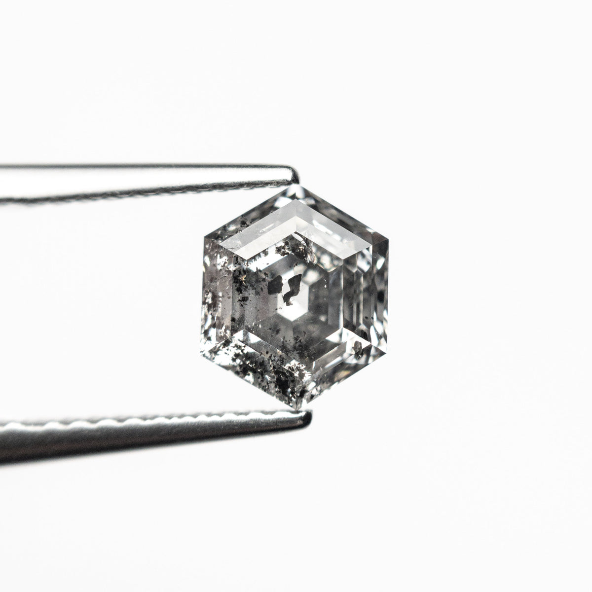 The 1.32ct 7.19x5.87x4.16mm Hexagon Step Cut 🇨🇦 27040-01 by East London jeweller Rachel Boston | Discover our collections of unique and timeless engagement rings, wedding rings, and modern fine jewellery.