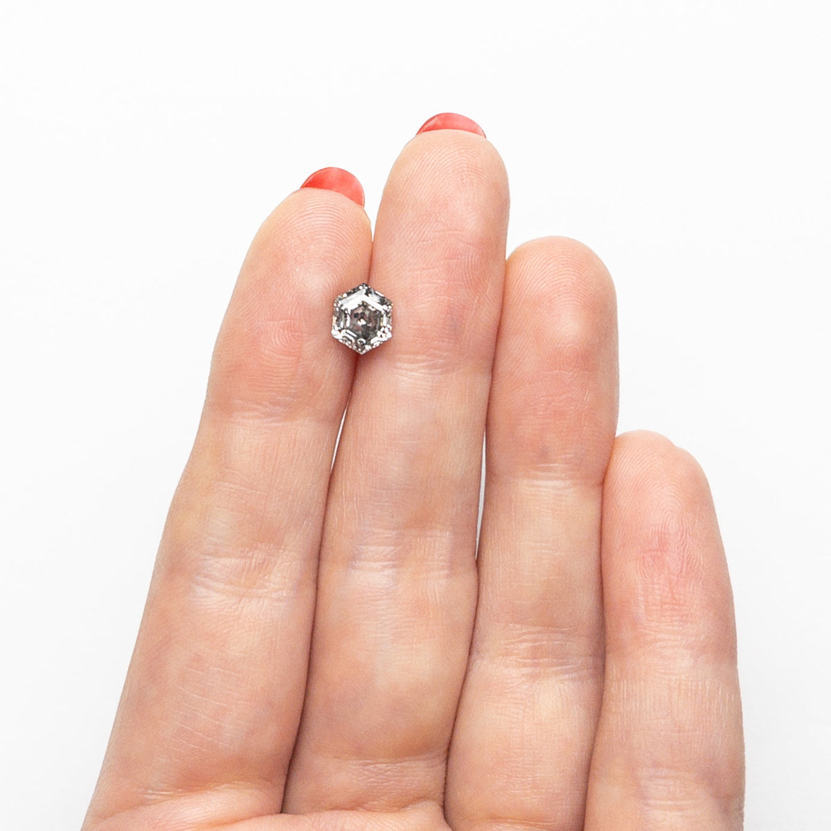 The 1.32ct 7.19x5.87x4.16mm Hexagon Step Cut 🇨🇦 27040-01 by East London jeweller Rachel Boston | Discover our collections of unique and timeless engagement rings, wedding rings, and modern fine jewellery.