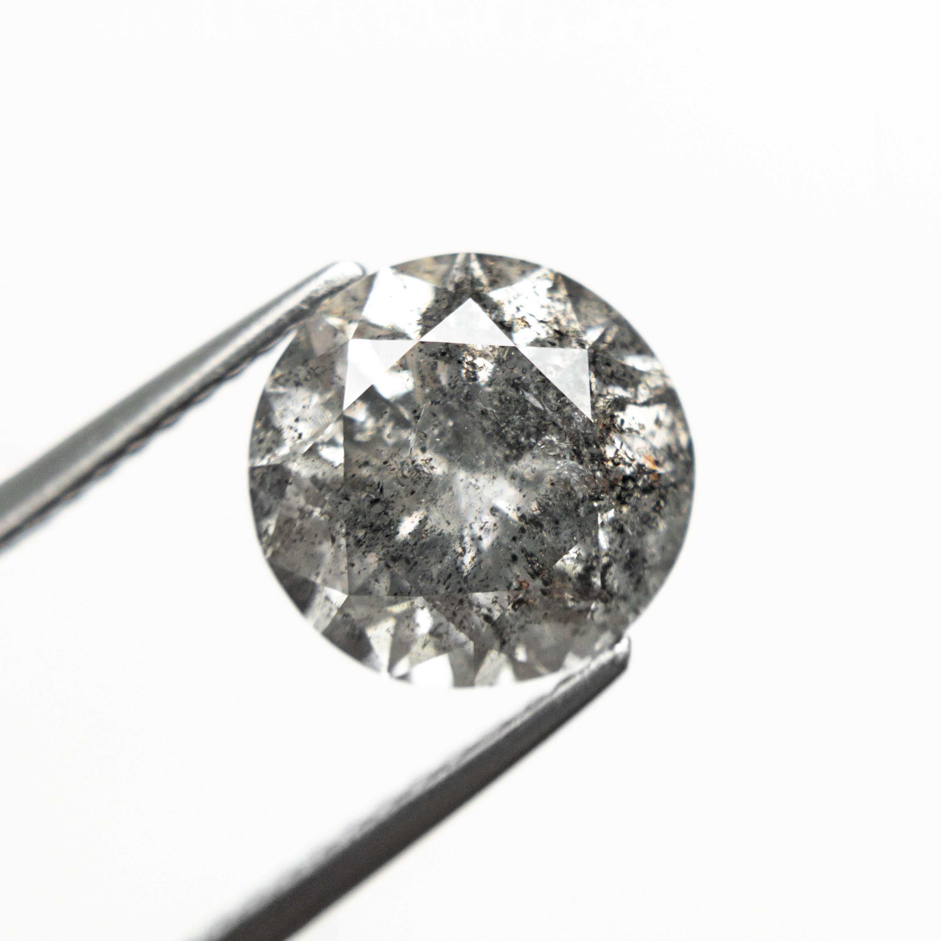 The 3.08ct 8.99x8.76x6.08mm Round Brilliant 27051-01 by East London jeweller Rachel Boston | Discover our collections of unique and timeless engagement rings, wedding rings, and modern fine jewellery.