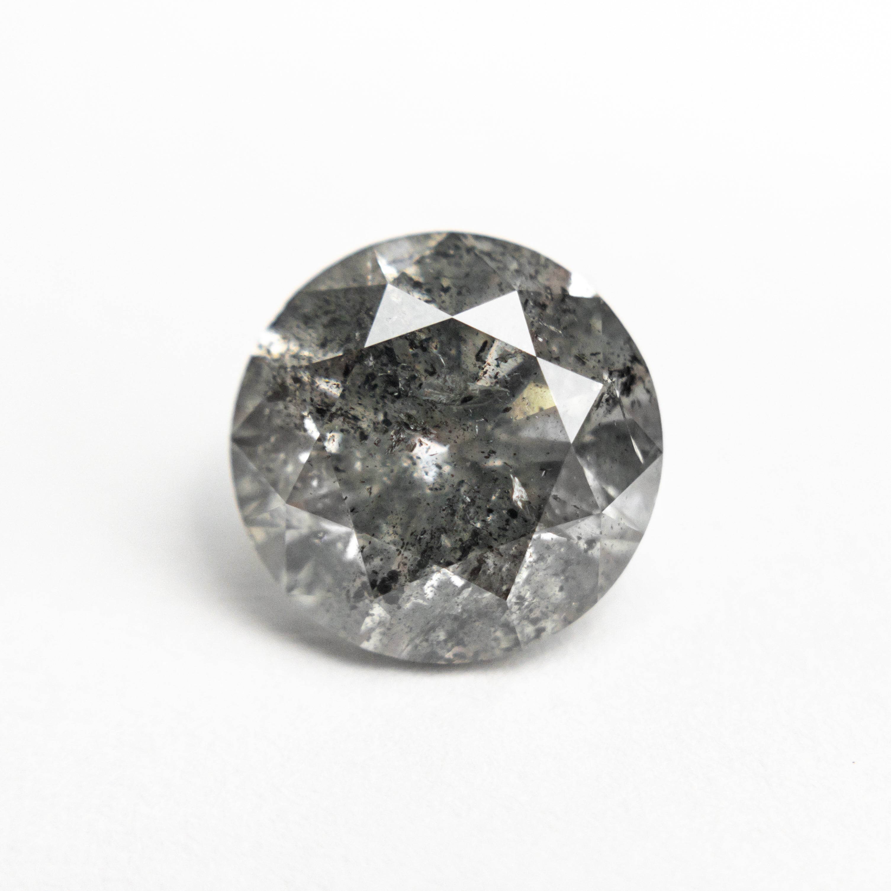 The 3.04ct 8.99x8.96x5.87mm Round Brilliant 27051-02 by East London jeweller Rachel Boston | Discover our collections of unique and timeless engagement rings, wedding rings, and modern fine jewellery.