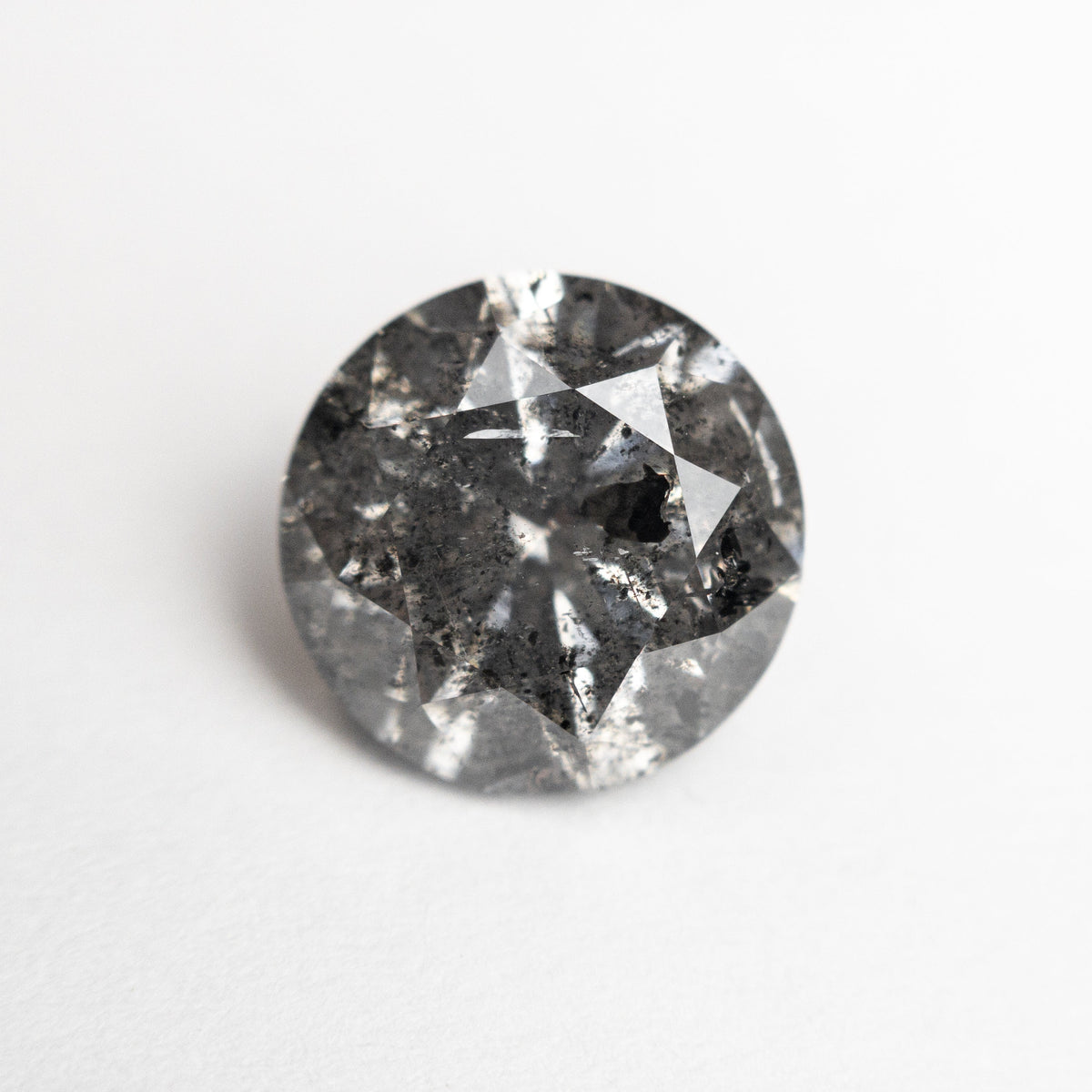 The 3.26ct 9.16x9.10x5.86mm Round Brilliant 27051-03 by East London jeweller Rachel Boston | Discover our collections of unique and timeless engagement rings, wedding rings, and modern fine jewellery.