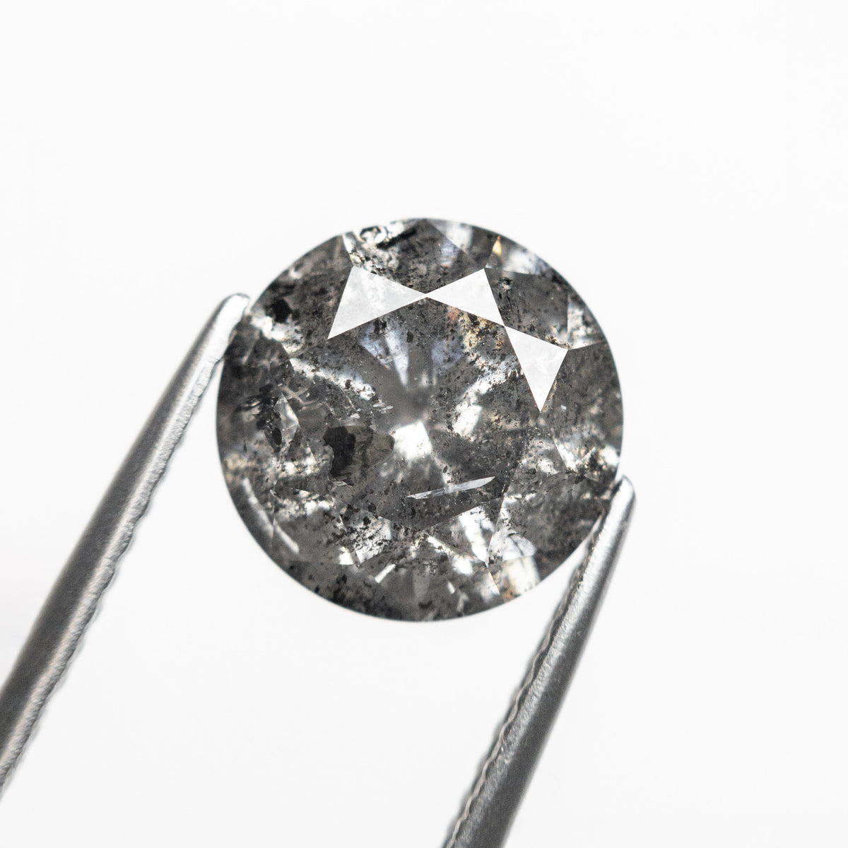 The 3.26ct 9.16x9.10x5.86mm Round Brilliant 27051-03 by East London jeweller Rachel Boston | Discover our collections of unique and timeless engagement rings, wedding rings, and modern fine jewellery.