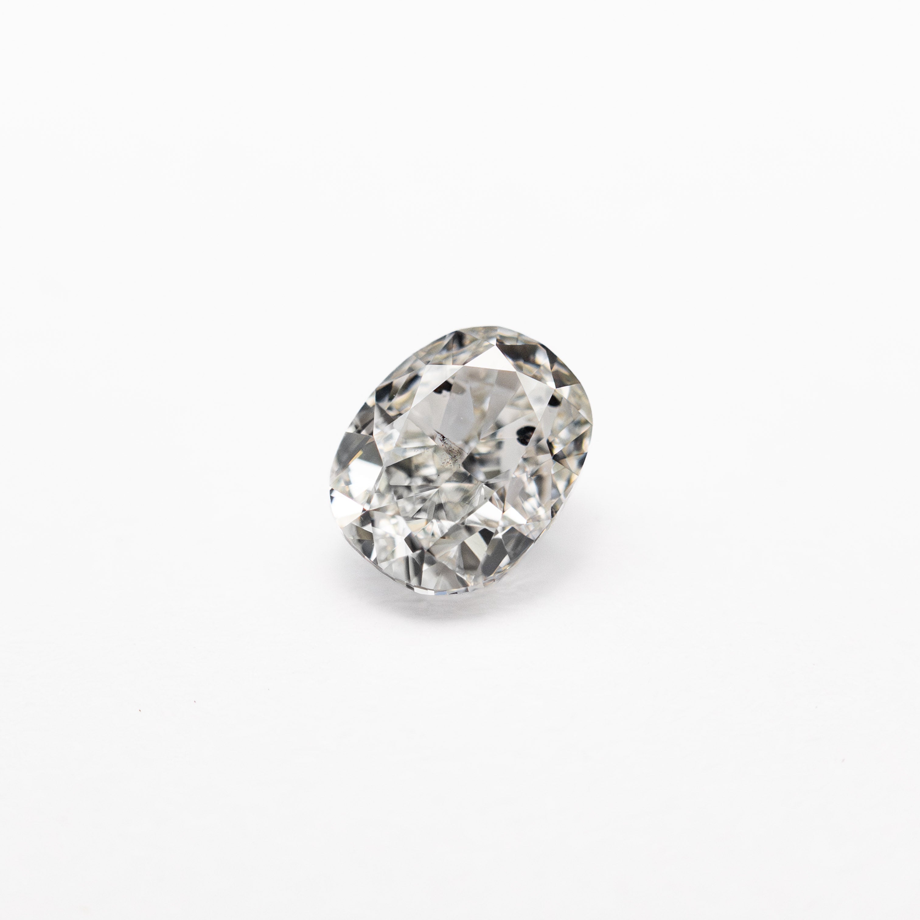 The 0.54ct 5.09x4.03x2.99mm SI2 G Oval Brilliant 27065-02 by East London jeweller Rachel Boston | Discover our collections of unique and timeless engagement rings, wedding rings, and modern fine jewellery.