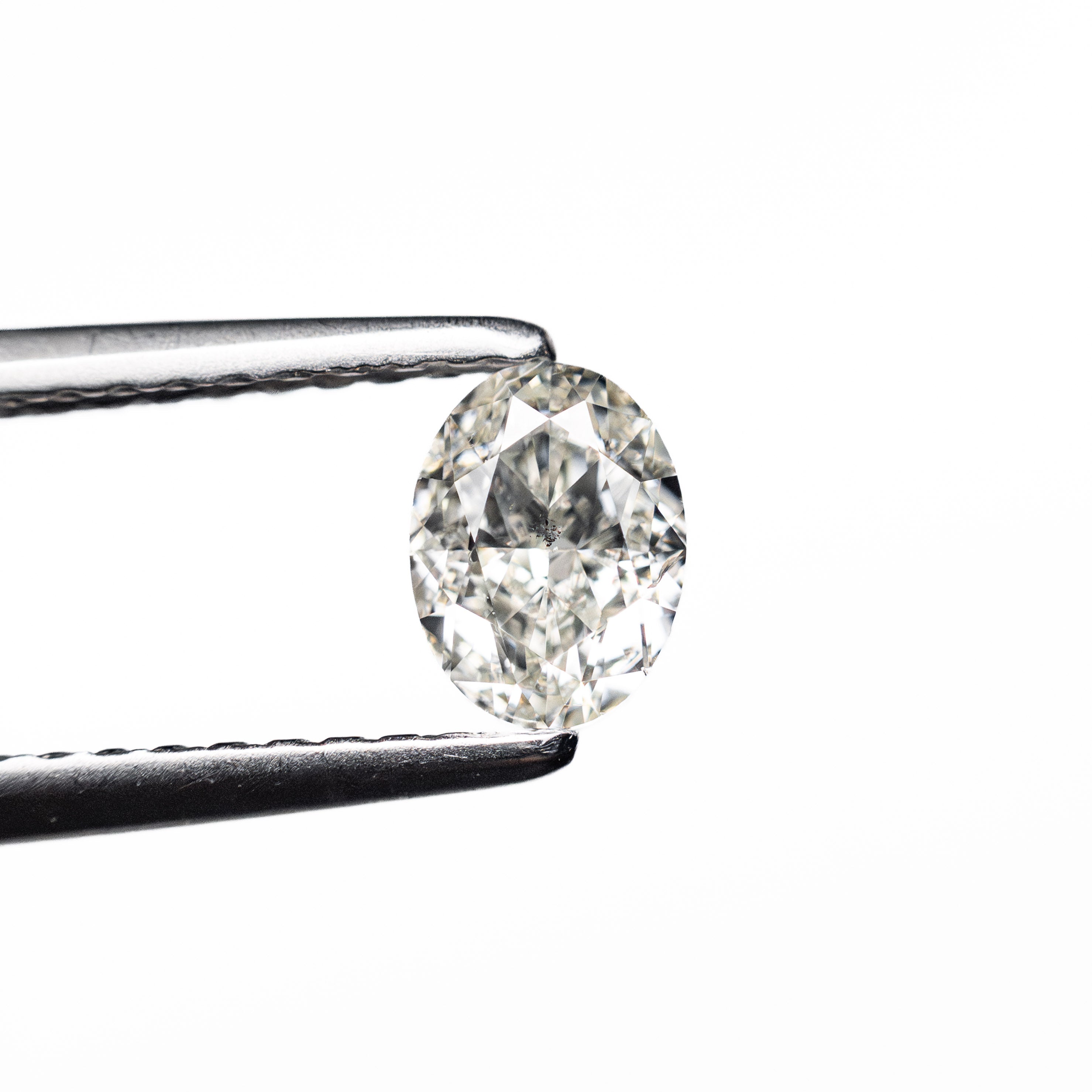 The 0.56ct 5.52x4.13x2.96mm SI1 I Oval Brilliant 27065-03 by East London jeweller Rachel Boston | Discover our collections of unique and timeless engagement rings, wedding rings, and modern fine jewellery.