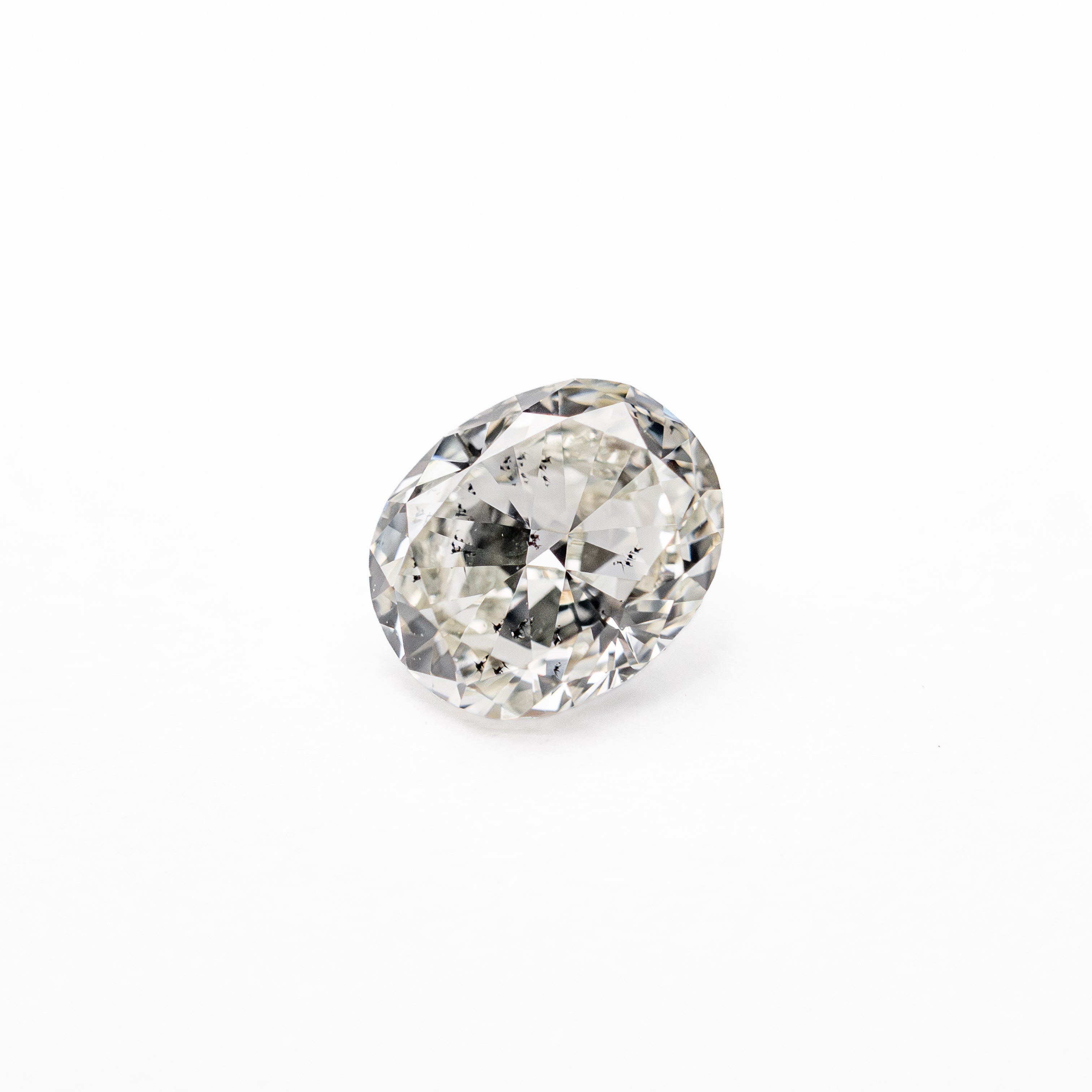 The 0.47ct 5.47x4.55x2.45mm SI2 I Oval Brilliant 27065-04 by East London jeweller Rachel Boston | Discover our collections of unique and timeless engagement rings, wedding rings, and modern fine jewellery.