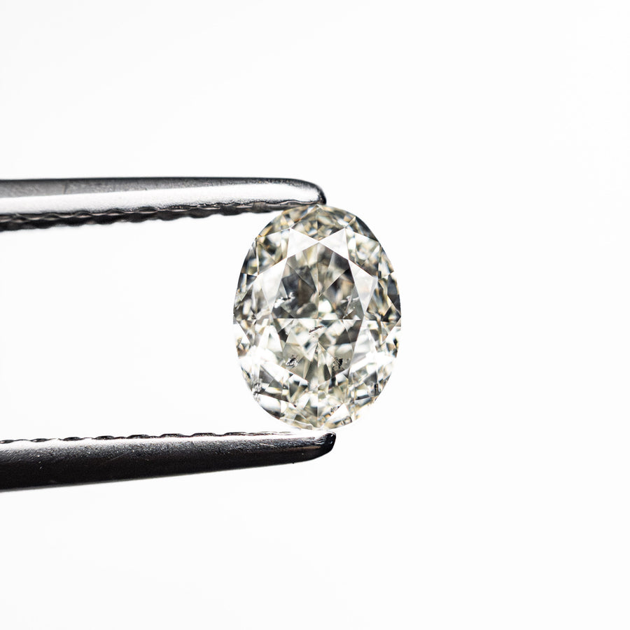 The 0.70ct 6.09x4.50x3.04mm SI2 K Oval Brilliant 27065-05 by East London jeweller Rachel Boston | Discover our collections of unique and timeless engagement rings, wedding rings, and modern fine jewellery. - Rachel Boston Jewellery