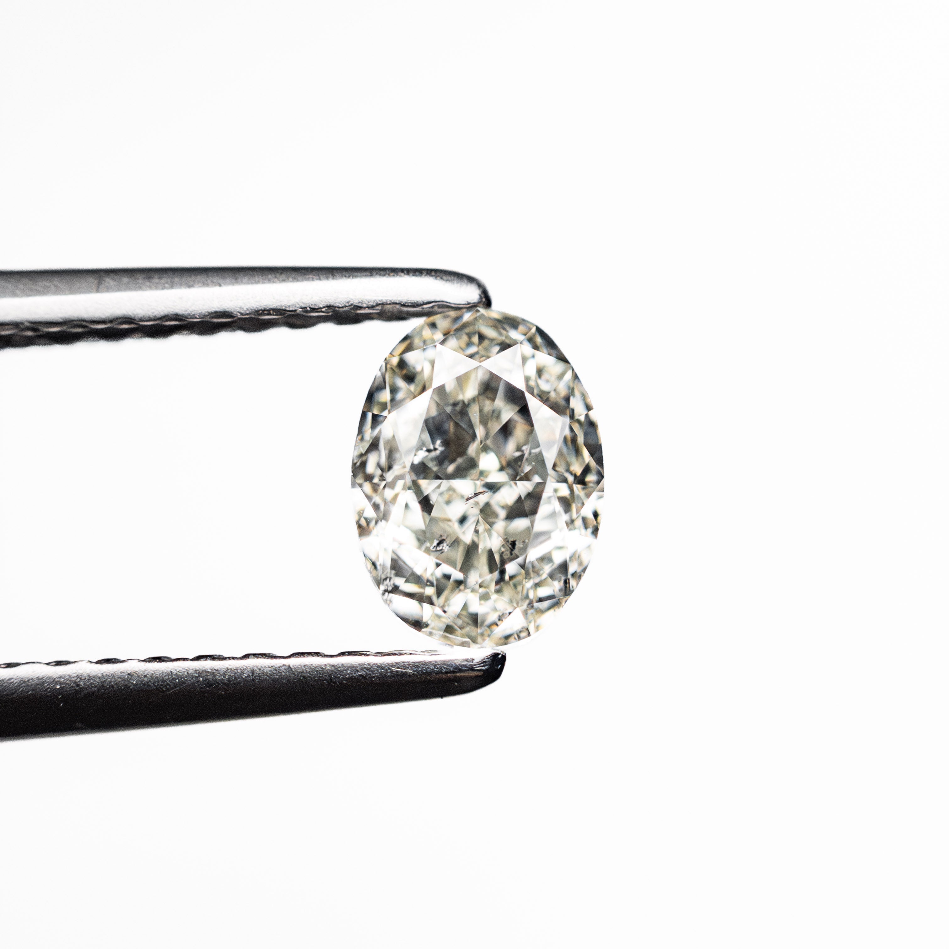The 0.70ct 6.09x4.50x3.04mm SI2 K Oval Brilliant 27065-05 by East London jeweller Rachel Boston | Discover our collections of unique and timeless engagement rings, wedding rings, and modern fine jewellery.