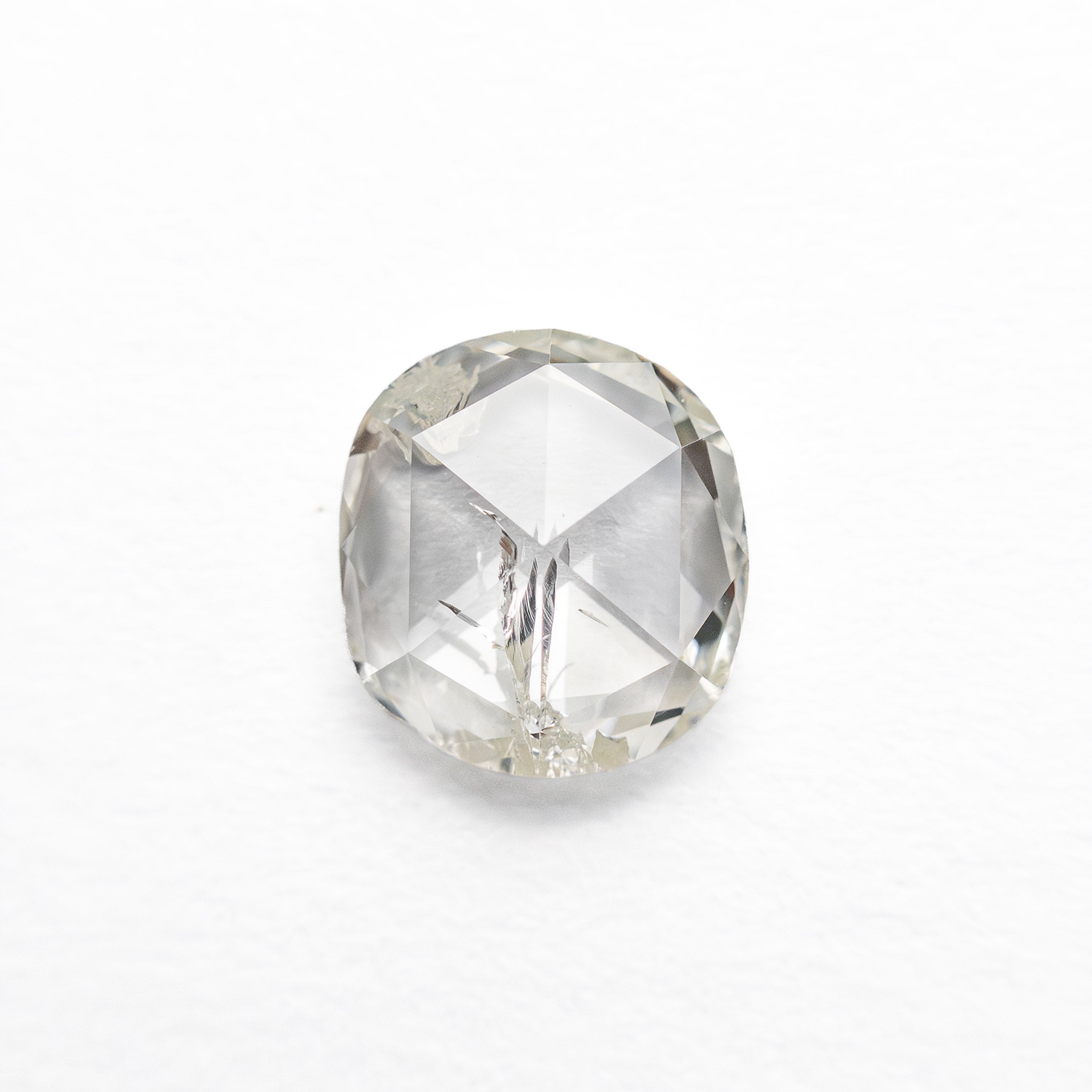 The 0.94ct 6.92x6.20x2.29mm I2 J Cushion Rosecut 27066-03 by East London jeweller Rachel Boston | Discover our collections of unique and timeless engagement rings, wedding rings, and modern fine jewellery.