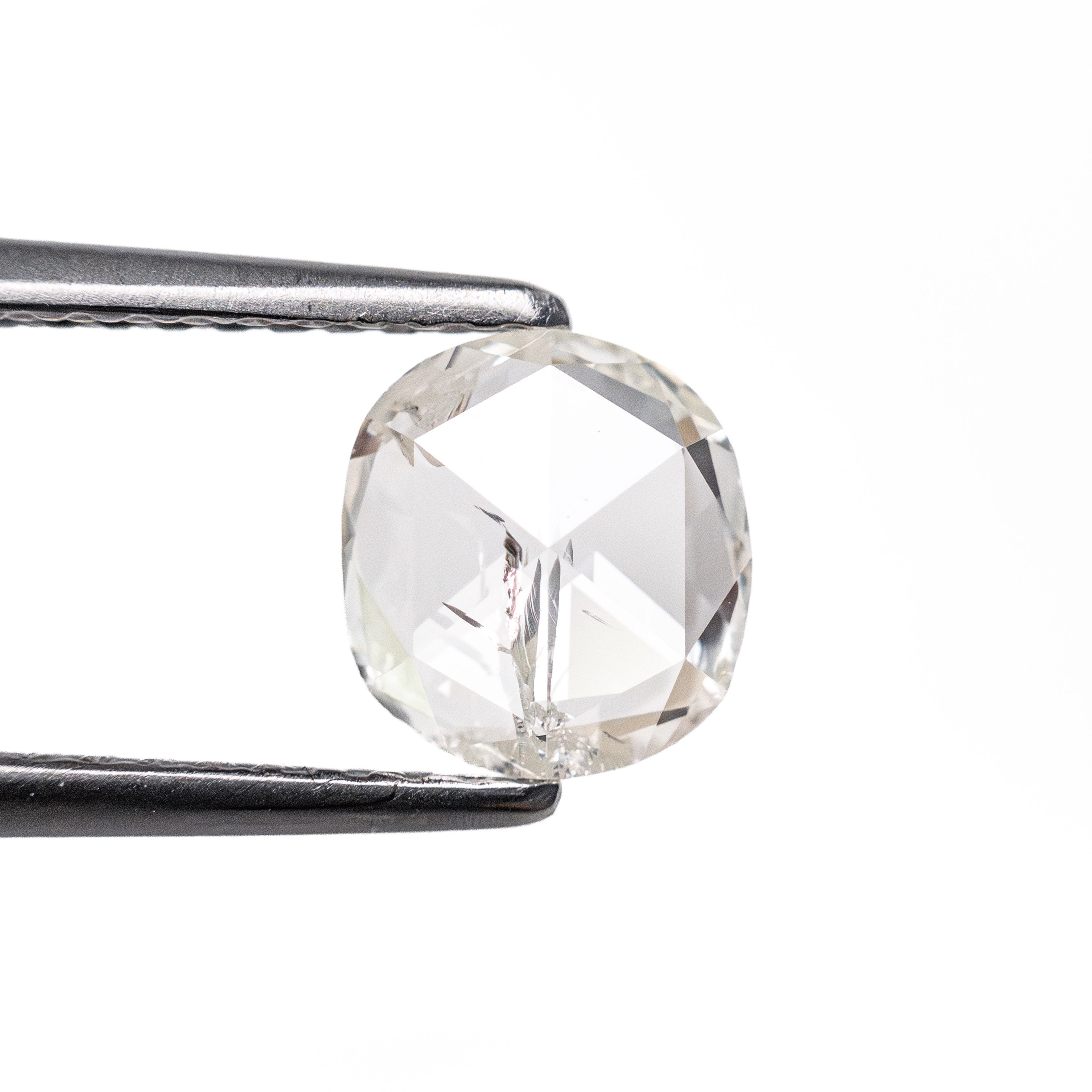 The 0.94ct 6.92x6.20x2.29mm I2 J Cushion Rosecut 27066-03 by East London jeweller Rachel Boston | Discover our collections of unique and timeless engagement rings, wedding rings, and modern fine jewellery.