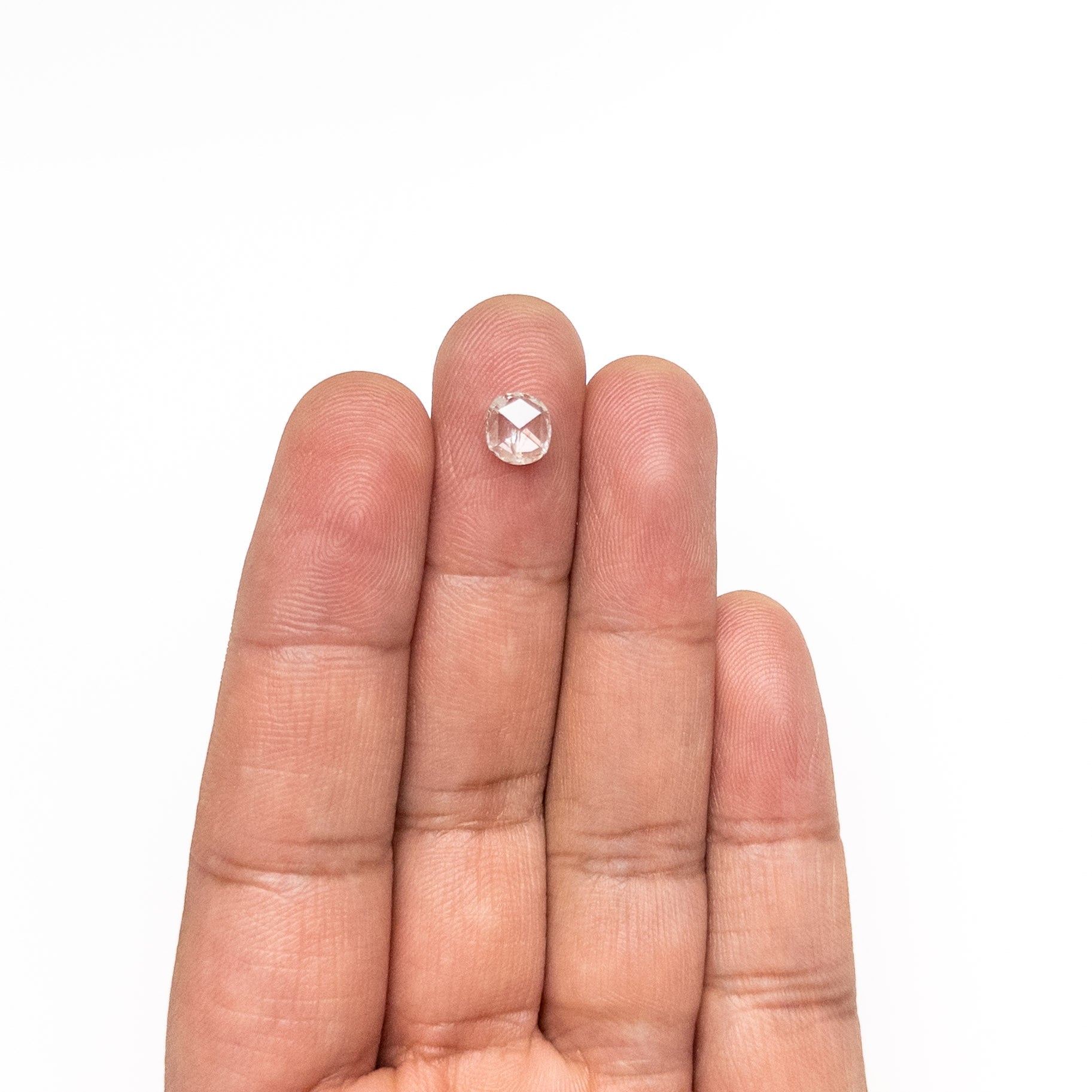 The 0.94ct 6.92x6.20x2.29mm I2 J Cushion Rosecut 27066-03 by East London jeweller Rachel Boston | Discover our collections of unique and timeless engagement rings, wedding rings, and modern fine jewellery.