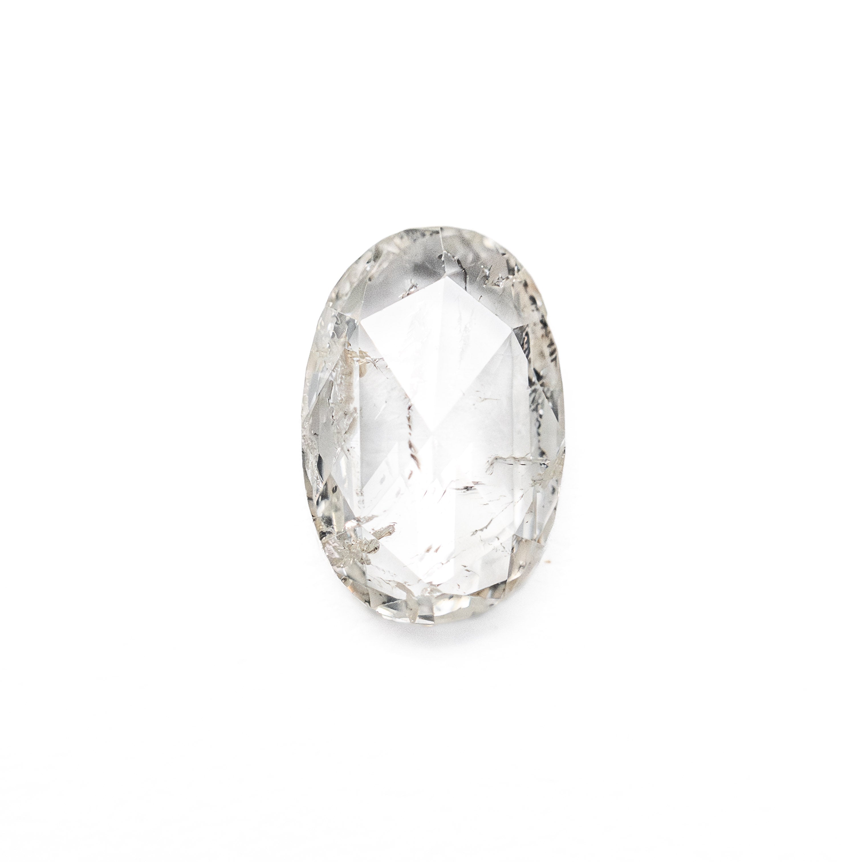 The 0.86ct 7.87x5.21x2.19mm I2 M Oval Rosecut 27066-05 by East London jeweller Rachel Boston | Discover our collections of unique and timeless engagement rings, wedding rings, and modern fine jewellery.