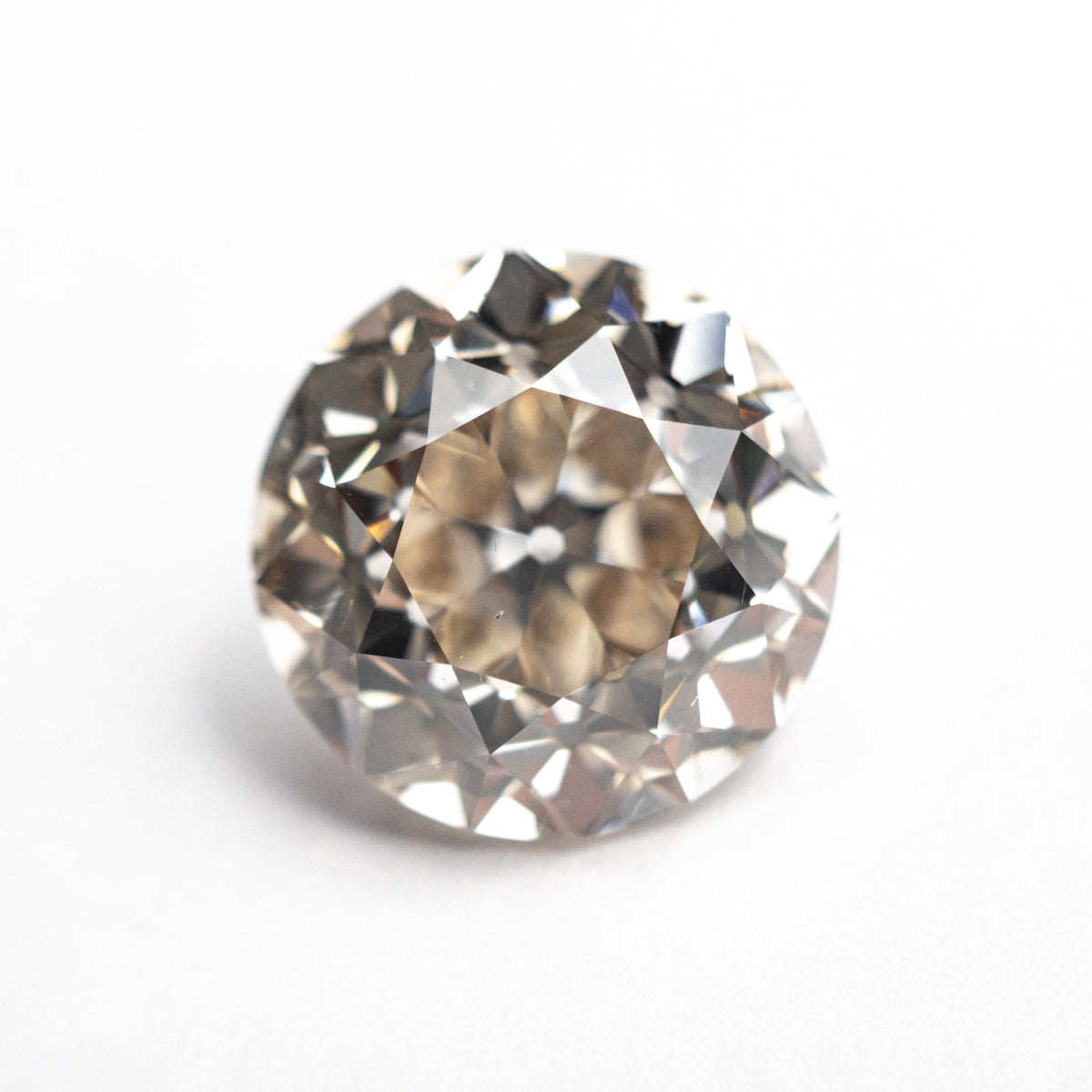The 5.10ct 10.30x10.26x7.27mm GIA SI1 Q-R Modern Antique Old European Cut 27077-01 by East London jeweller Rachel Boston | Discover our collections of unique and timeless engagement rings, wedding rings, and modern fine jewellery.
