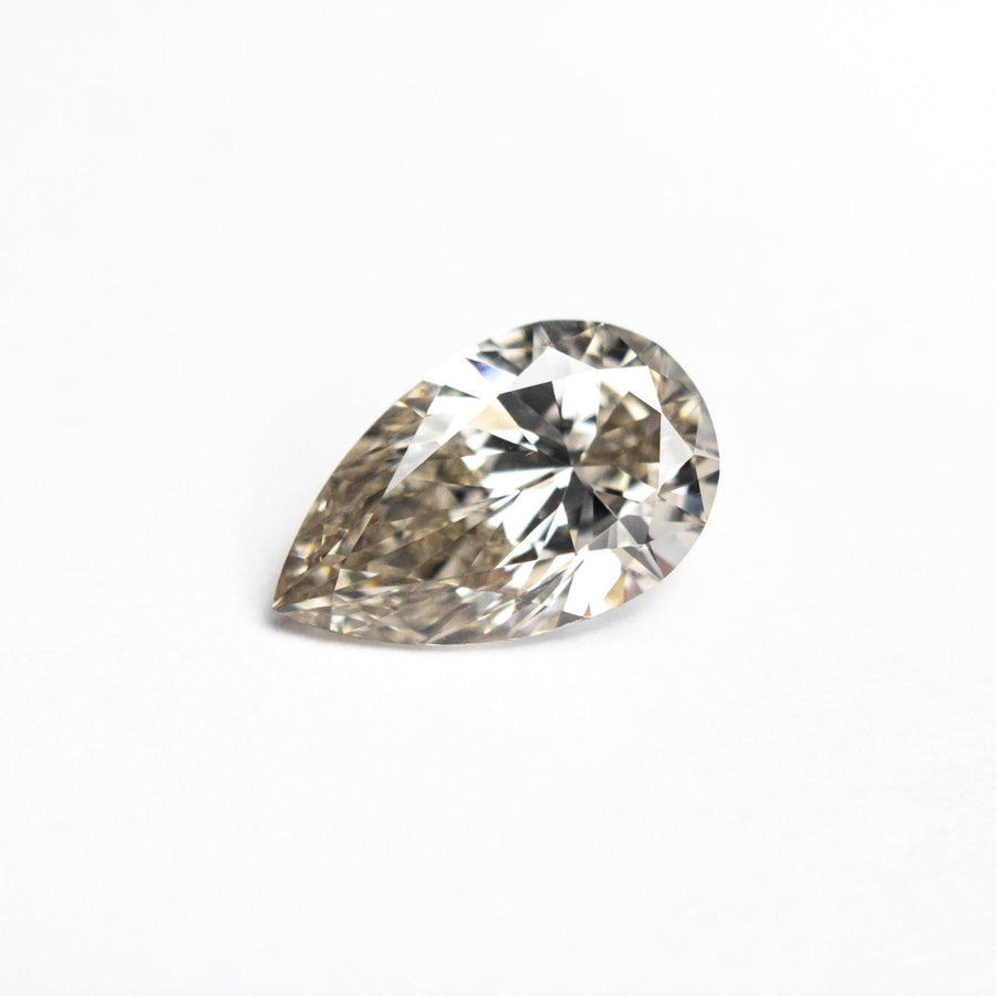 The 1.00ct 8.95x5.53x3.40mm VS2 Q-R Pear Brilliant 27081-05 by East London jeweller Rachel Boston | Discover our collections of unique and timeless engagement rings, wedding rings, and modern fine jewellery. - Rachel Boston Jewellery