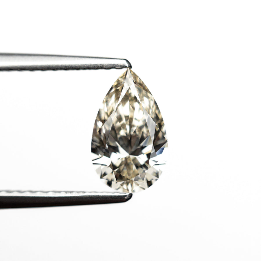 The 1.00ct 8.95x5.53x3.40mm VS2 Q-R Pear Brilliant 27081-05 by East London jeweller Rachel Boston | Discover our collections of unique and timeless engagement rings, wedding rings, and modern fine jewellery. - Rachel Boston Jewellery