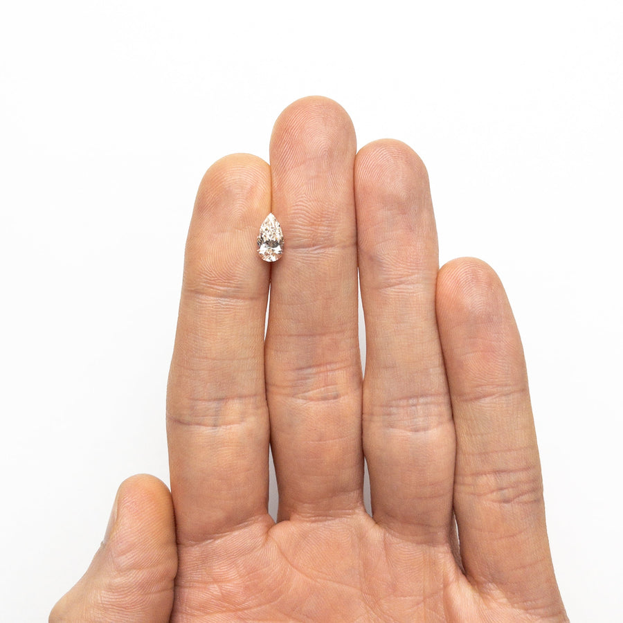 The 1.00ct 8.94x5.02x3.58mm VS2 K Pear Brilliant 27081-07 by East London jeweller Rachel Boston | Discover our collections of unique and timeless engagement rings, wedding rings, and modern fine jewellery. - Rachel Boston Jewellery
