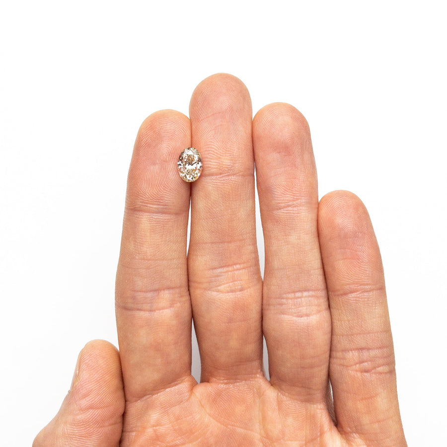 The 1.54ct 8.65x6.26x4.18mm SI1 C3 Oval Brilliant 27085-01 by East London jeweller Rachel Boston | Discover our collections of unique and timeless engagement rings, wedding rings, and modern fine jewellery. - Rachel Boston Jewellery