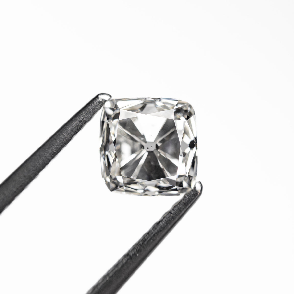 The 1.20ct 5.66x5.61x4.67mm SI2 H Modern Antique Old Mine Cut 27130-12 by East London jeweller Rachel Boston | Discover our collections of unique and timeless engagement rings, wedding rings, and modern fine jewellery.
