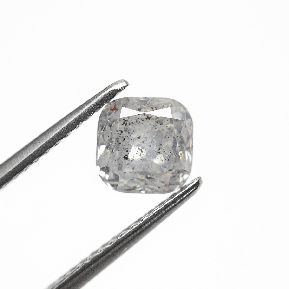 The 1.42ct 6.17x6.17x4.12mm Cushion Brilliant 27223-03 by East London jeweller Rachel Boston | Discover our collections of unique and timeless engagement rings, wedding rings, and modern fine jewellery.