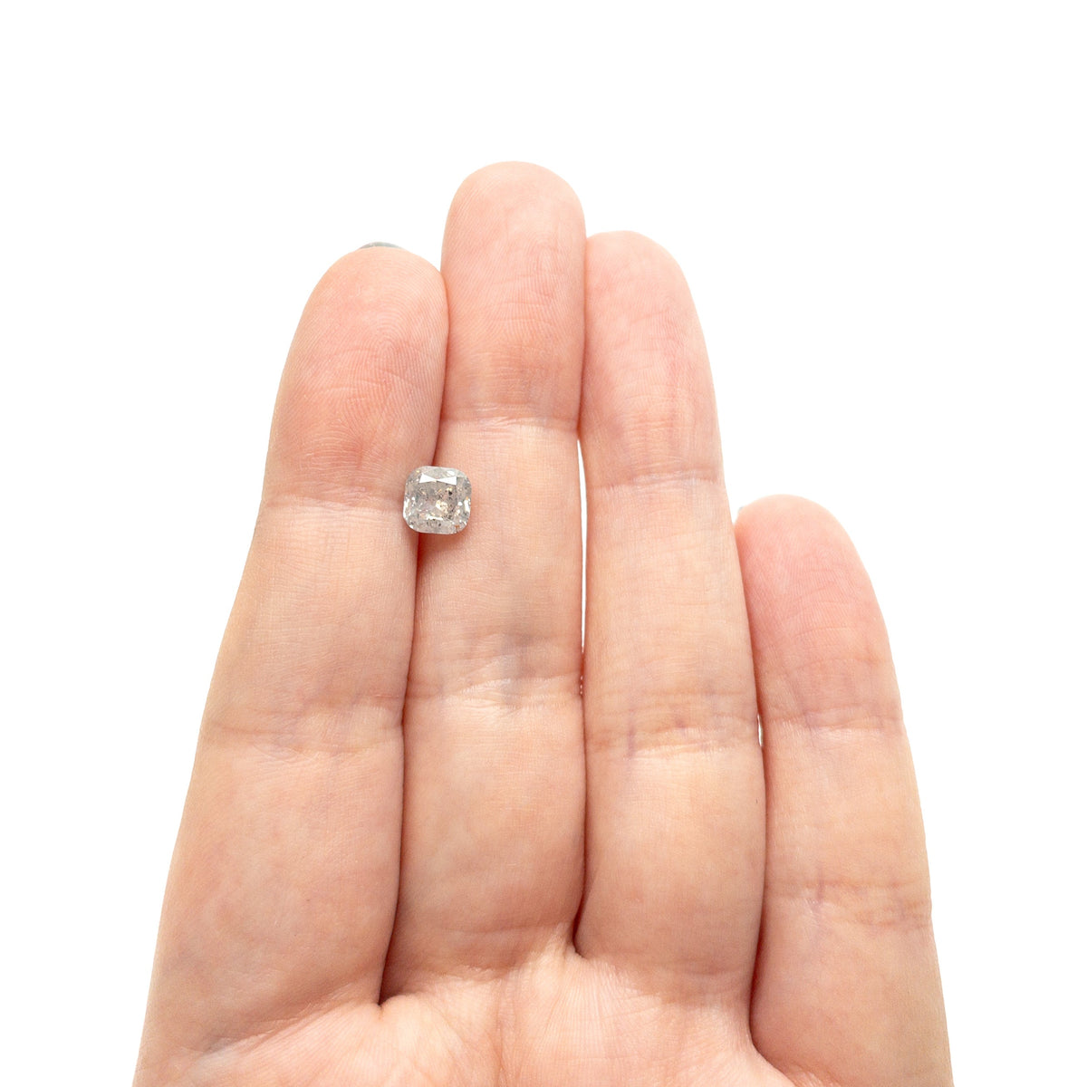 The 1.42ct 6.17x6.17x4.12mm Cushion Brilliant 27223-03 by East London jeweller Rachel Boston | Discover our collections of unique and timeless engagement rings, wedding rings, and modern fine jewellery.