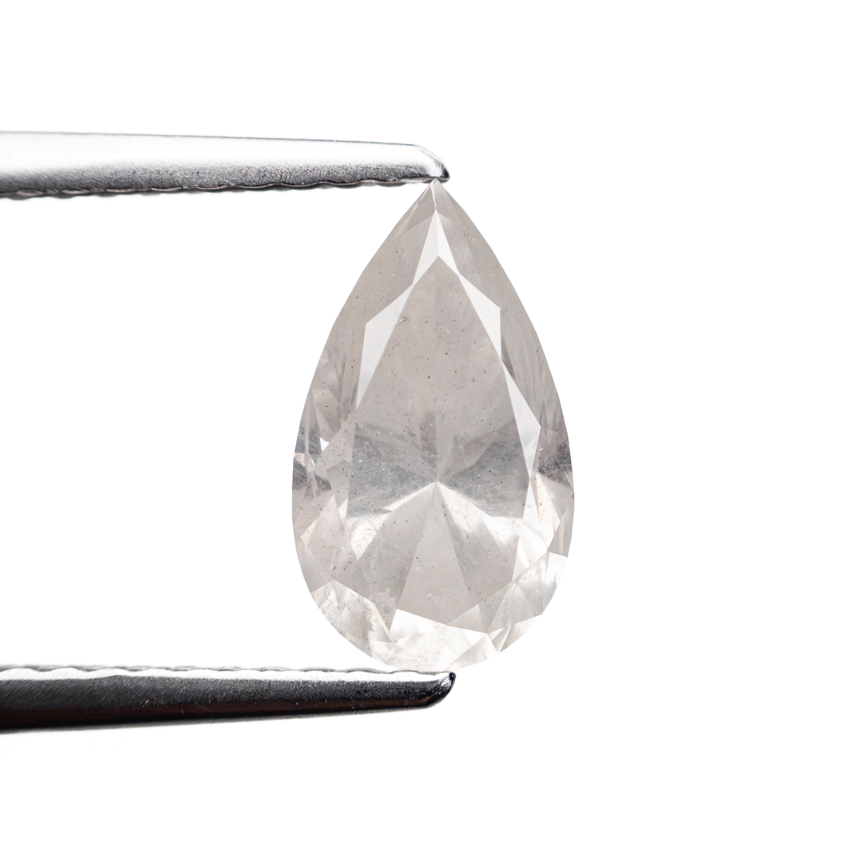 The 1.29ct 9.40x5.38x4.12mm Pear Brilliant 27223-13 by East London jeweller Rachel Boston | Discover our collections of unique and timeless engagement rings, wedding rings, and modern fine jewellery.