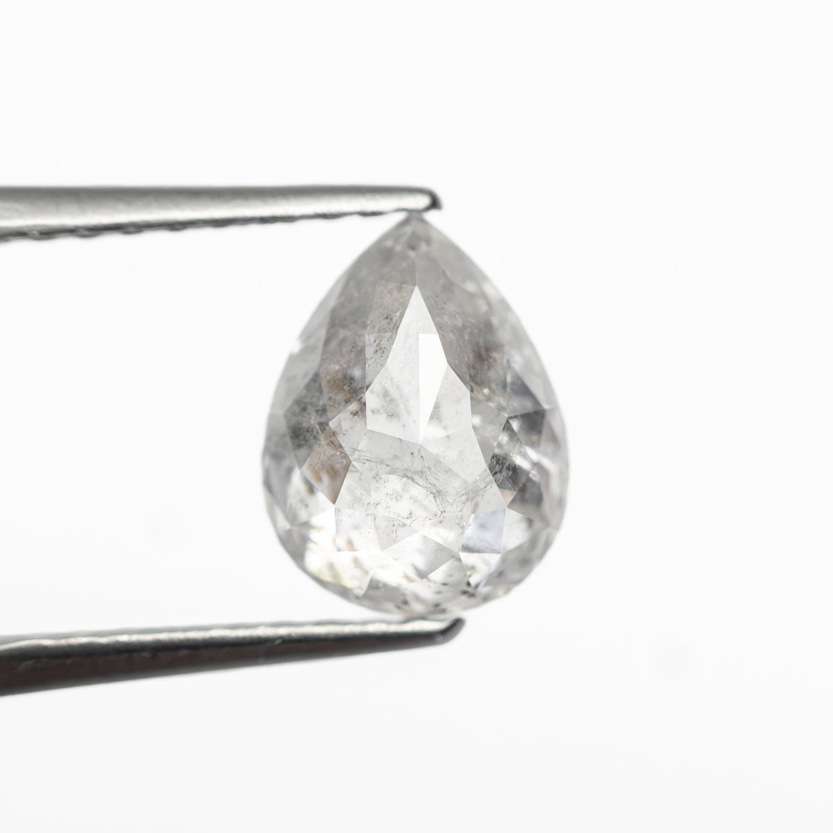 The 1.29ct 7.83x5.95x3.42mm Pear Double Cut 27223-14 by East London jeweller Rachel Boston | Discover our collections of unique and timeless engagement rings, wedding rings, and modern fine jewellery.