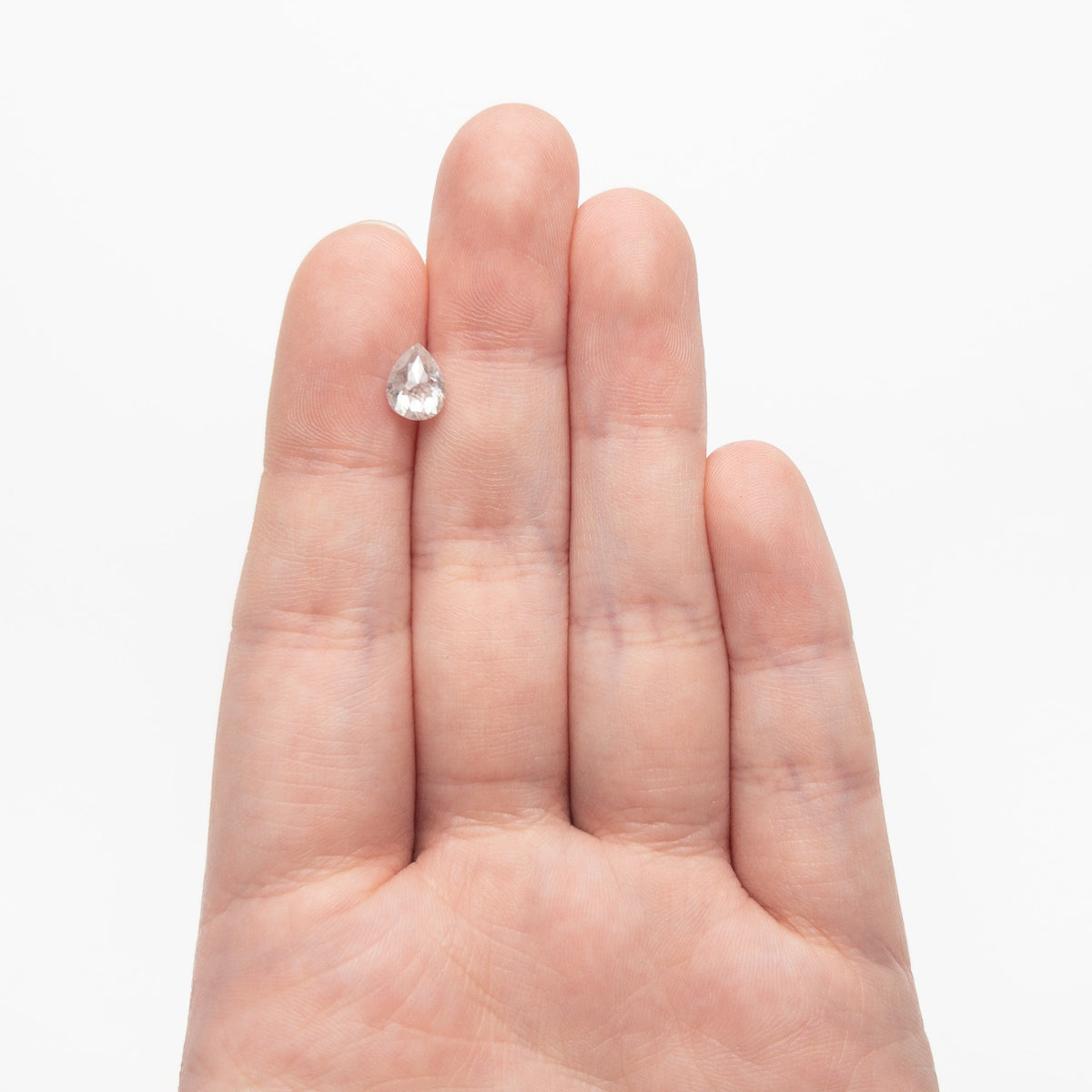 The 1.29ct 7.83x5.95x3.42mm Pear Double Cut 27223-14 by East London jeweller Rachel Boston | Discover our collections of unique and timeless engagement rings, wedding rings, and modern fine jewellery.