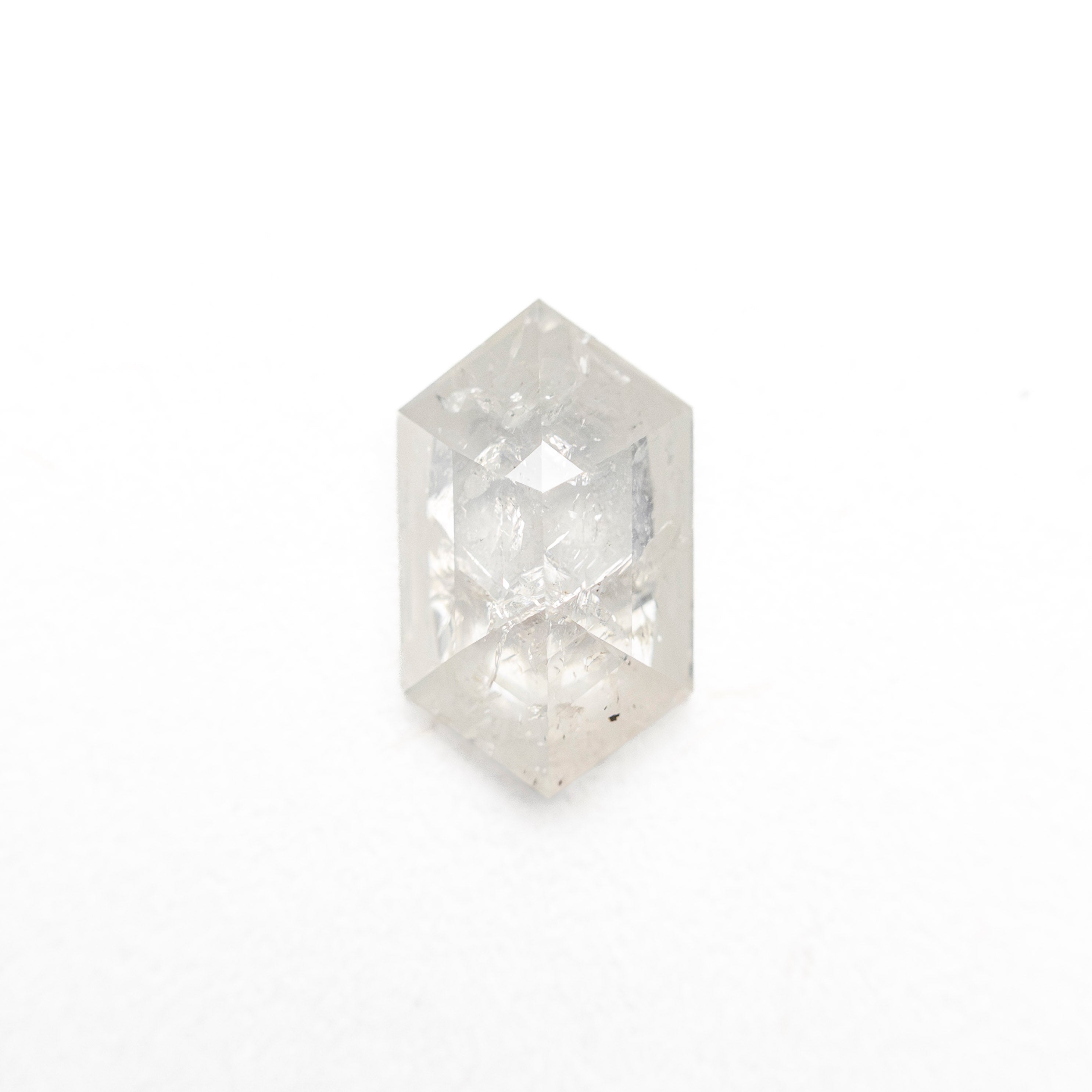 The 0.68ct 7.76x4.59x2.35mm Hexagon Rosecut 27223-24 by East London jeweller Rachel Boston | Discover our collections of unique and timeless engagement rings, wedding rings, and modern fine jewellery.