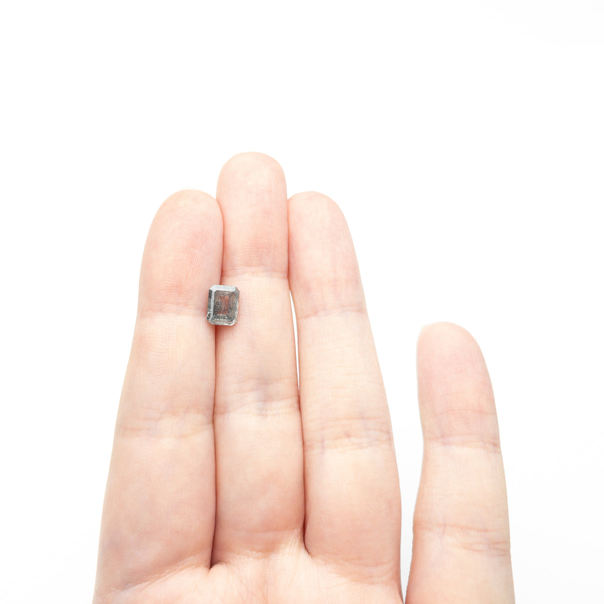 The 1.48ct 7.51x5.94x3.26mm Cut Corner Rectangle Step Cut 27225-27 by East London jeweller Rachel Boston | Discover our collections of unique and timeless engagement rings, wedding rings, and modern fine jewellery.