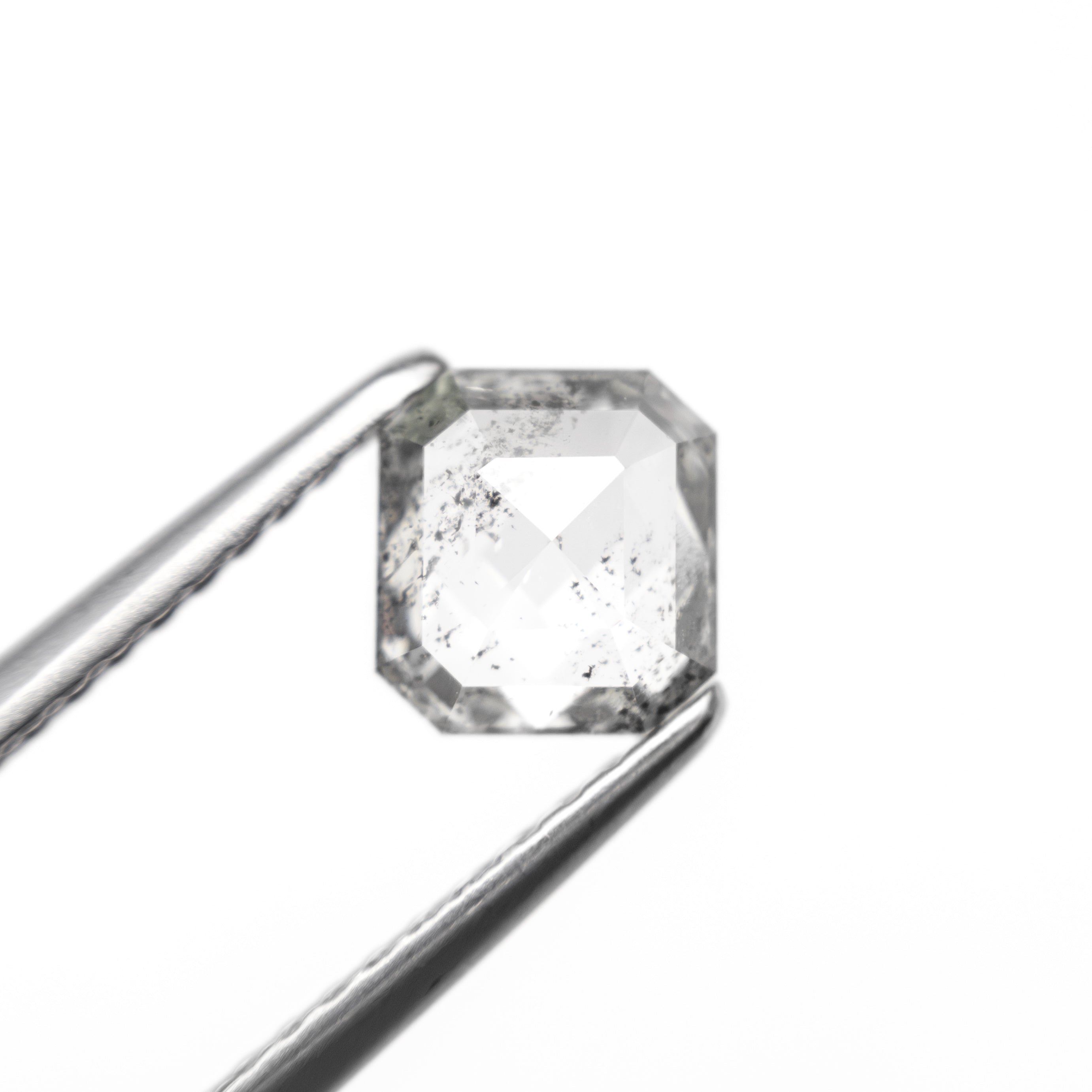 The 1.03ct 5.79x5.38x3.09mm Cut Corner Rectangle Step Cut 27225-28 by East London jeweller Rachel Boston | Discover our collections of unique and timeless engagement rings, wedding rings, and modern fine jewellery.