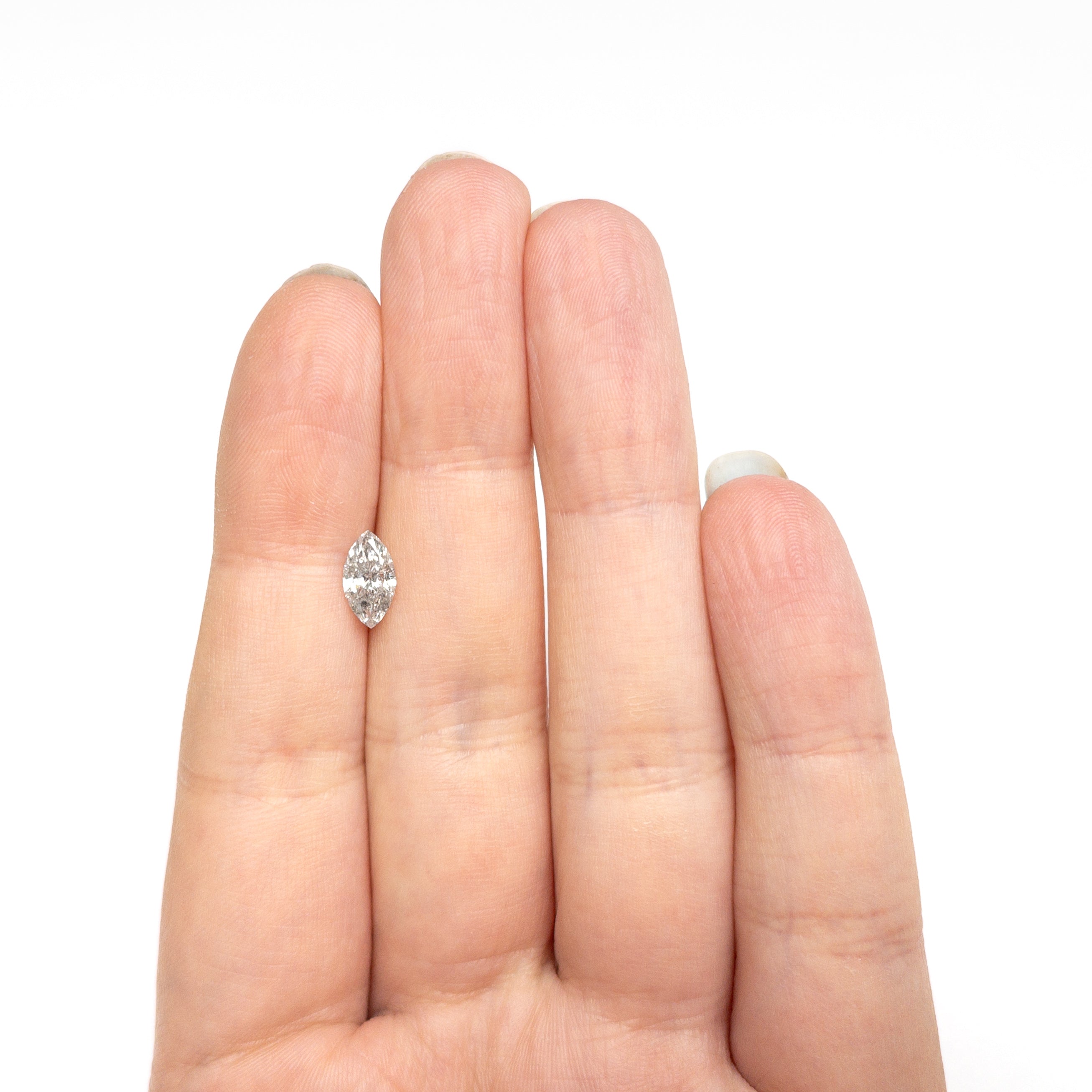 The 0.78ct 9.04x4.87x3.03mm Marquise Brilliant 27226-03 by East London jeweller Rachel Boston | Discover our collections of unique and timeless engagement rings, wedding rings, and modern fine jewellery.
