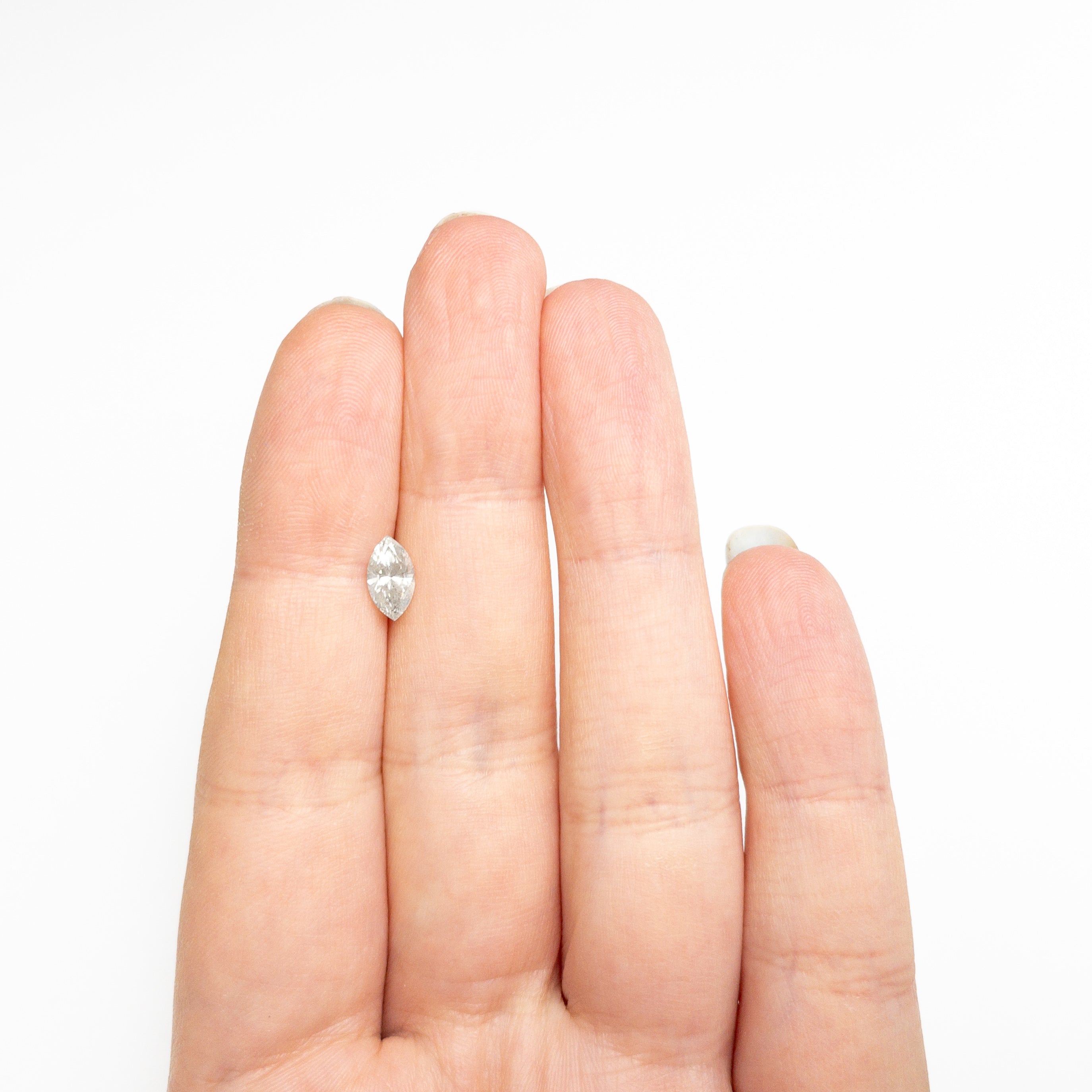 The 0.70ct 8.21x4.58x3.12mm Marquise Brilliant 27226-06 by East London jeweller Rachel Boston | Discover our collections of unique and timeless engagement rings, wedding rings, and modern fine jewellery.