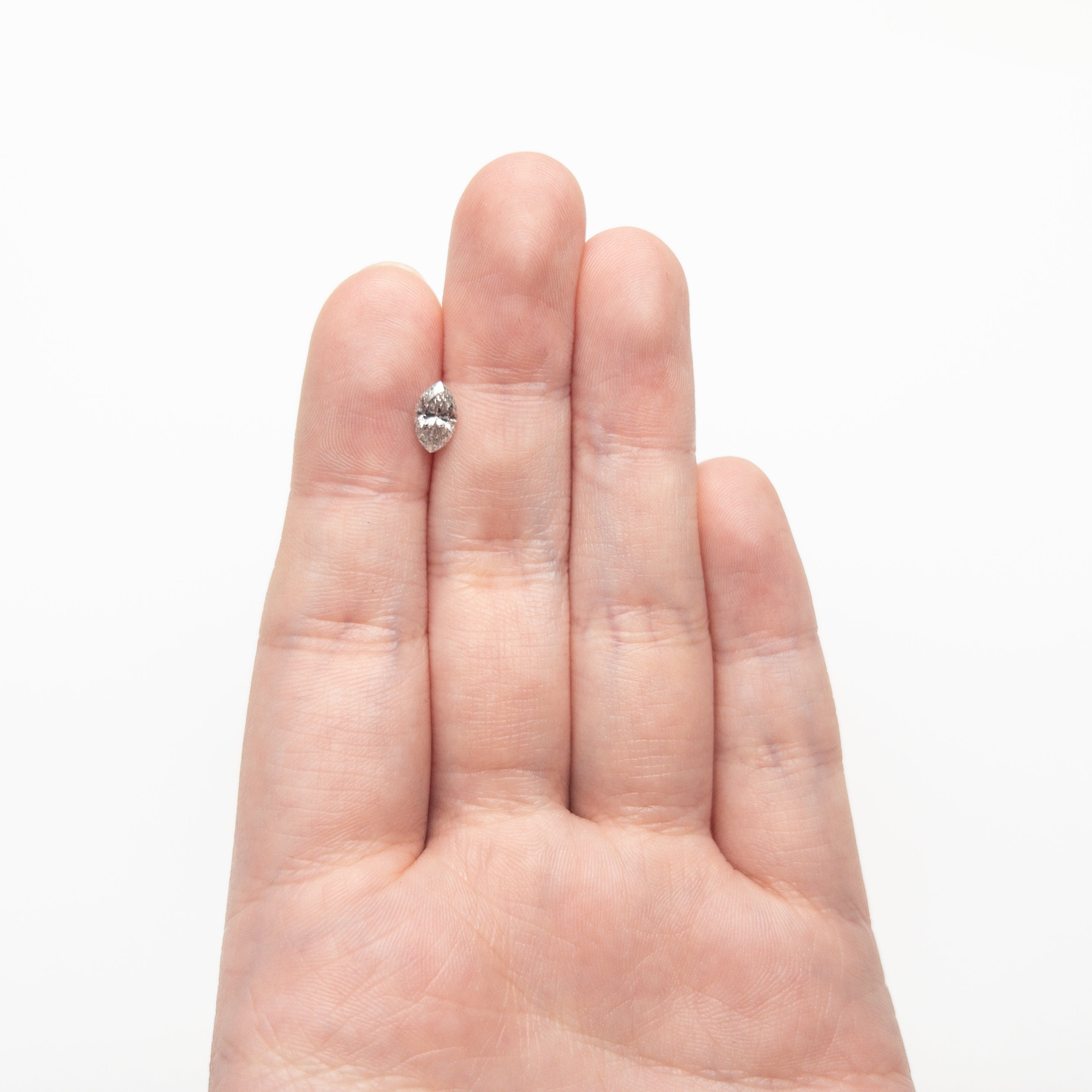 The 0.76ct 8.03x4.77x3.35mm Marquise Brilliant 27226-16 by East London jeweller Rachel Boston | Discover our collections of unique and timeless engagement rings, wedding rings, and modern fine jewellery.