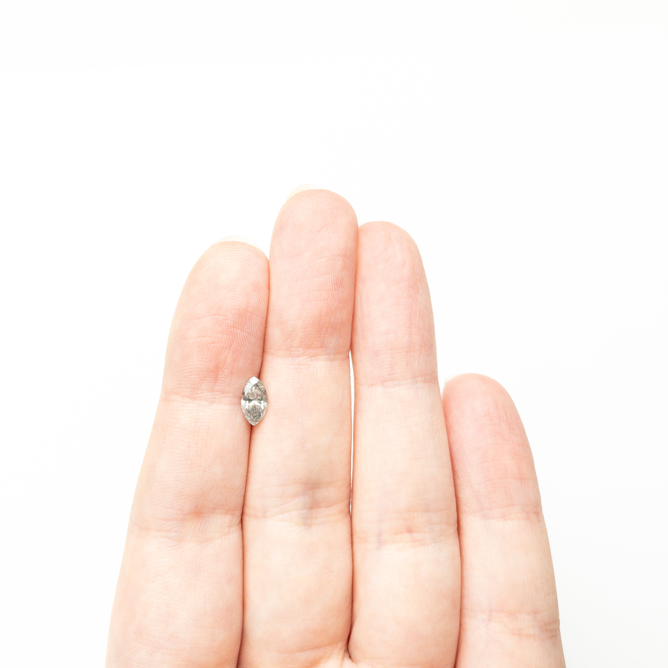 The 0.60ct 8.05x4.24x2.90mm Marquise Brilliant 27226-27 by East London jeweller Rachel Boston | Discover our collections of unique and timeless engagement rings, wedding rings, and modern fine jewellery.