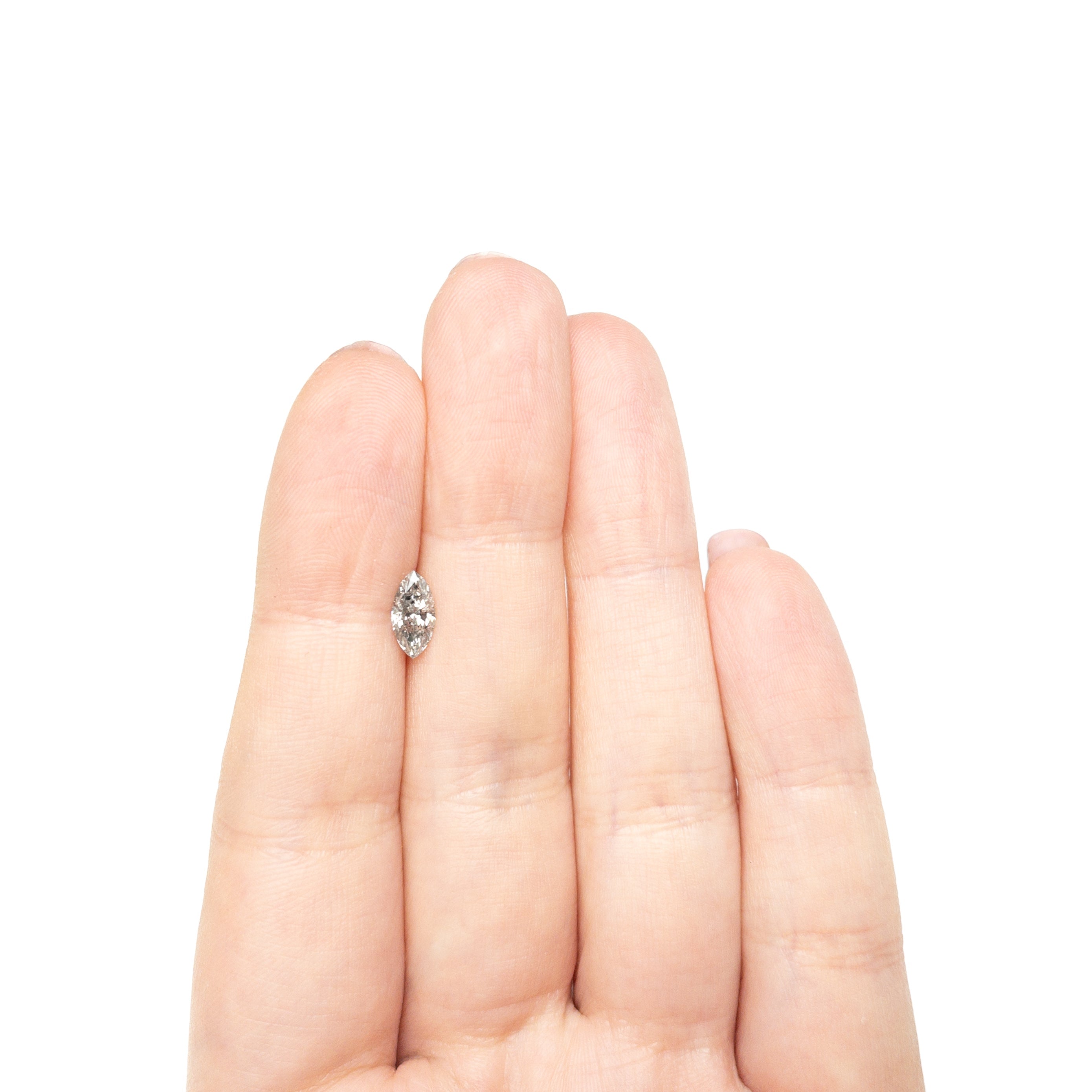 The 0.65ct 8.69x4.23x2.83mm Marquise Brilliant 27226-37 by East London jeweller Rachel Boston | Discover our collections of unique and timeless engagement rings, wedding rings, and modern fine jewellery.