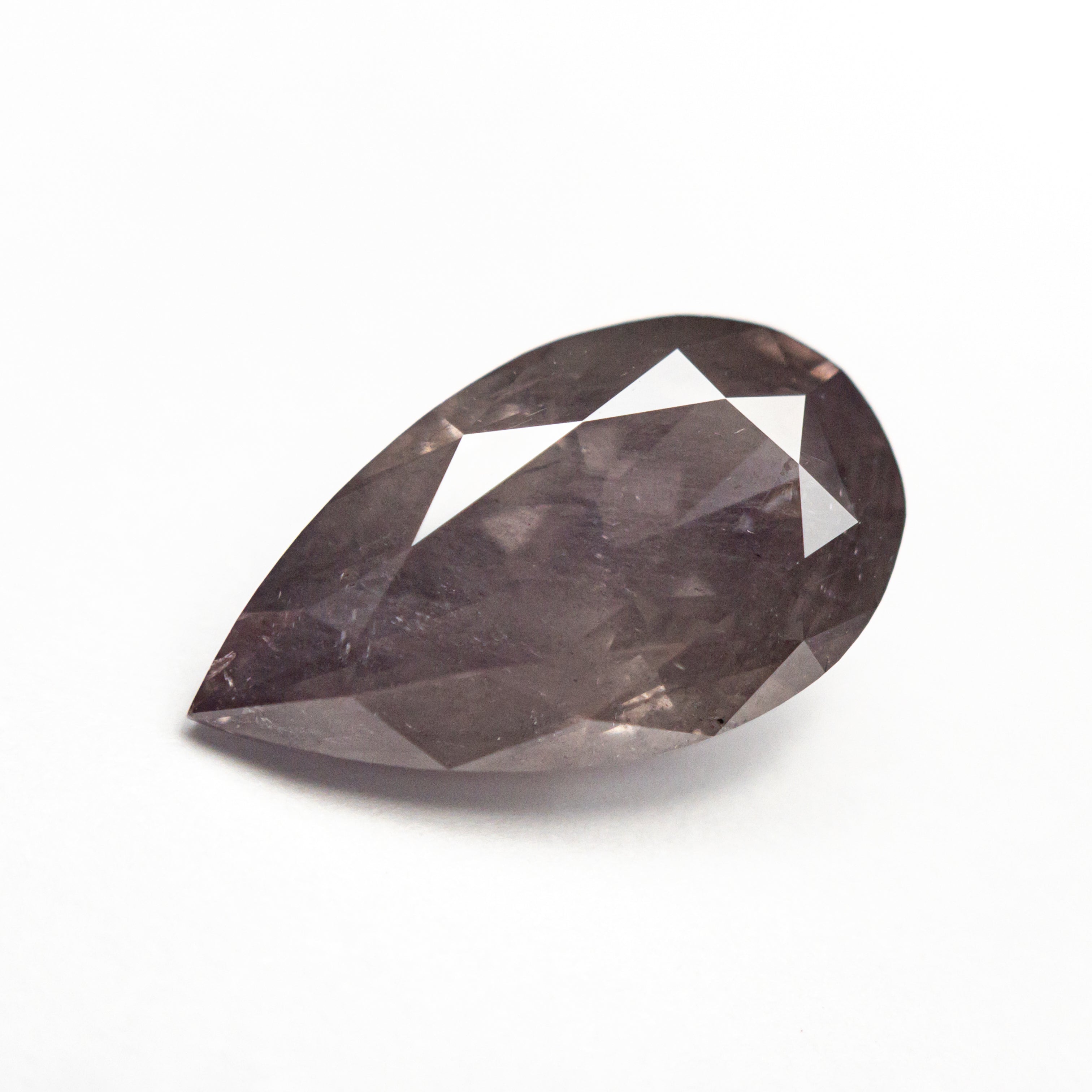The 3.31ct 12.81x7.29x4.96mm GIA Fancy Brown-Pink Pear Brilliant 27233-01 by East London jeweller Rachel Boston | Discover our collections of unique and timeless engagement rings, wedding rings, and modern fine jewellery.