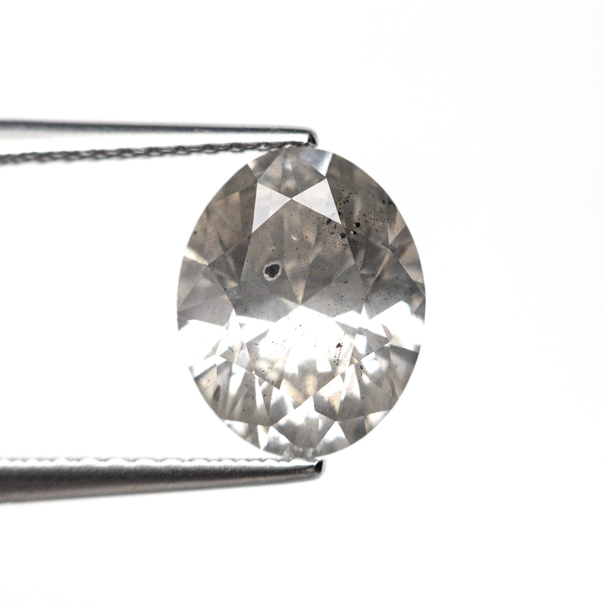 The 2.26ct 9.72x7.79x4.77mm Oval Brilliant 27241-03 by East London jeweller Rachel Boston | Discover our collections of unique and timeless engagement rings, wedding rings, and modern fine jewellery.