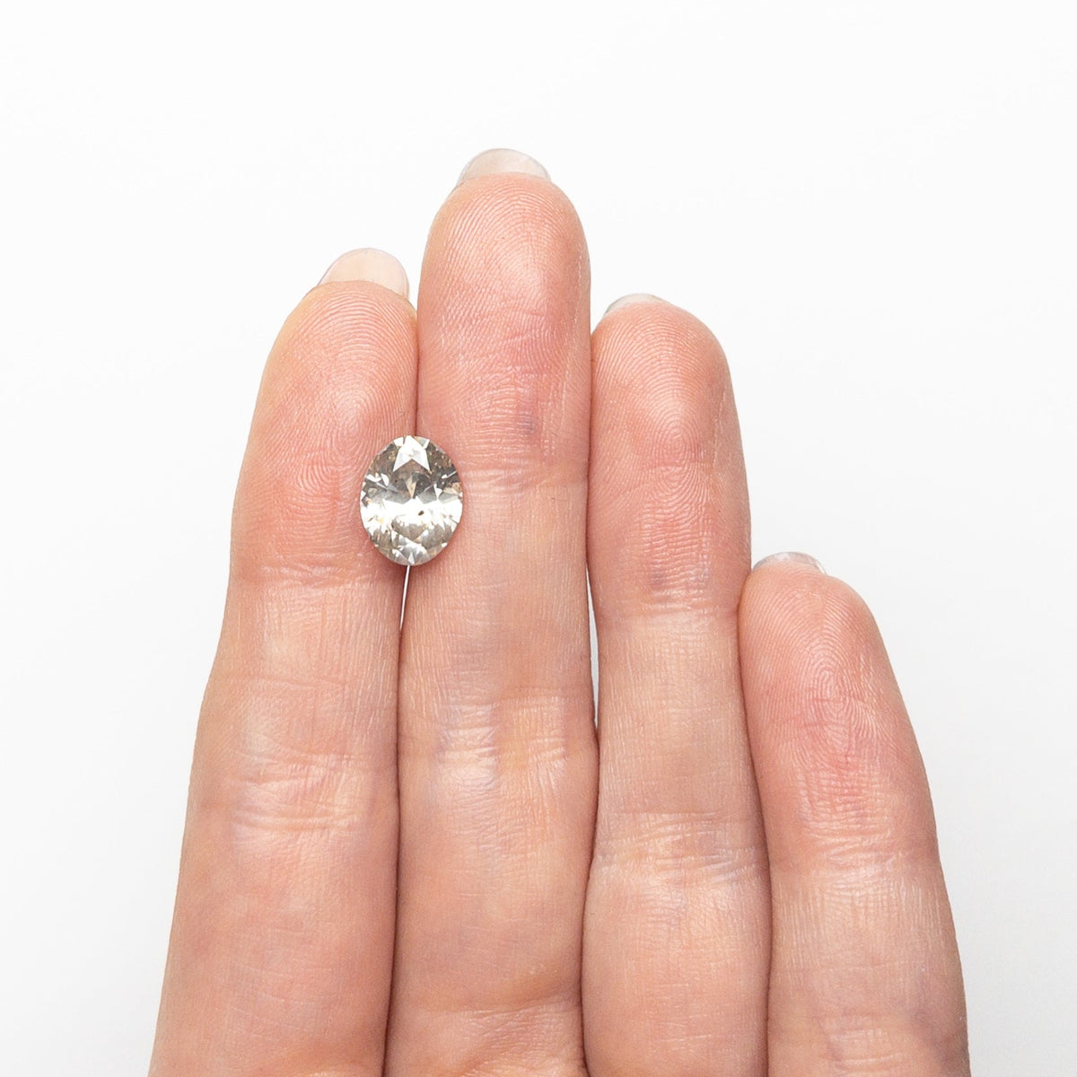 The 2.26ct 9.72x7.79x4.77mm Oval Brilliant 27241-03 by East London jeweller Rachel Boston | Discover our collections of unique and timeless engagement rings, wedding rings, and modern fine jewellery.