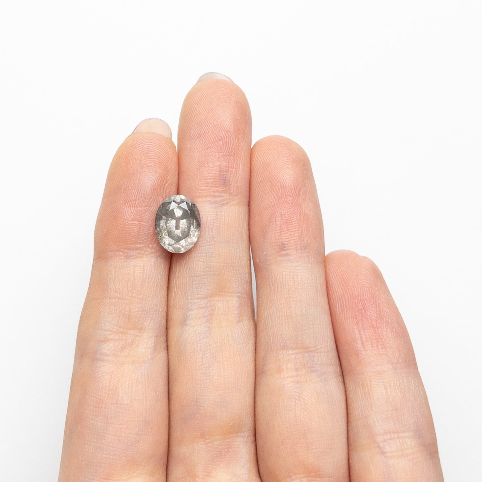 The 3.44ct 10.08x8.02x5.64mm Oval Brilliant 27241-04 by East London jeweller Rachel Boston | Discover our collections of unique and timeless engagement rings, wedding rings, and modern fine jewellery.