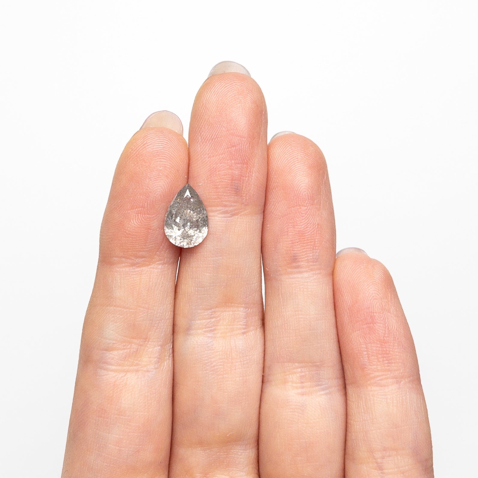 The 2.10ct 10.81x7.41x4.44mm Pear Brilliant 27241-05 by East London jeweller Rachel Boston | Discover our collections of unique and timeless engagement rings, wedding rings, and modern fine jewellery.
