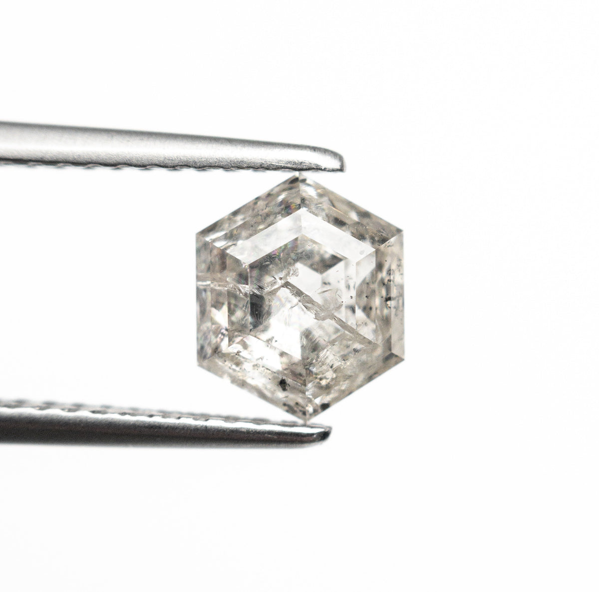 The 1.70ct 7.53x6.25x4.51mm Hexagon Step Cut 🇨🇦 27262-01 by East London jeweller Rachel Boston | Discover our collections of unique and timeless engagement rings, wedding rings, and modern fine jewellery.