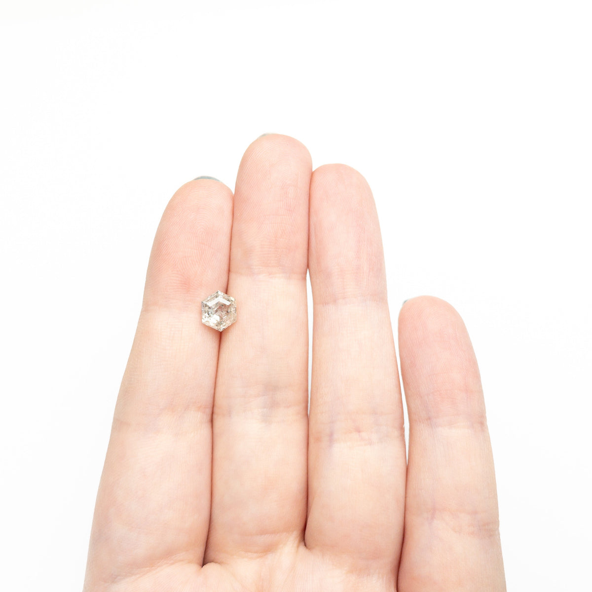 The 1.70ct 7.53x6.25x4.51mm Hexagon Step Cut 🇨🇦 27262-01 by East London jeweller Rachel Boston | Discover our collections of unique and timeless engagement rings, wedding rings, and modern fine jewellery.