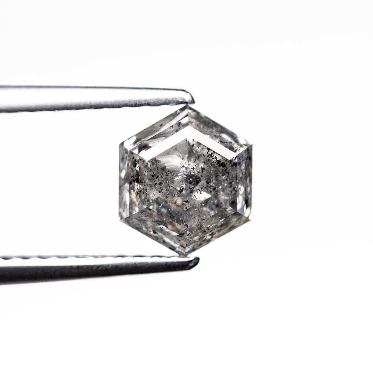 The 1.45ct 6.96x6.13x4.57mm Hexagon Step Cut 🇨🇦 27266-01 by East London jeweller Rachel Boston | Discover our collections of unique and timeless engagement rings, wedding rings, and modern fine jewellery.