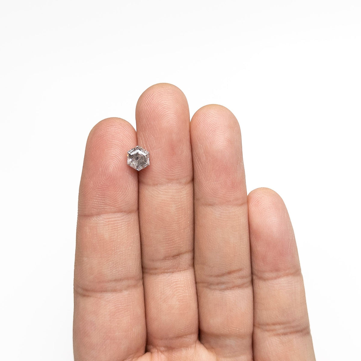 The 1.45ct 6.96x6.13x4.57mm Hexagon Step Cut 🇨🇦 27266-01 by East London jeweller Rachel Boston | Discover our collections of unique and timeless engagement rings, wedding rings, and modern fine jewellery.